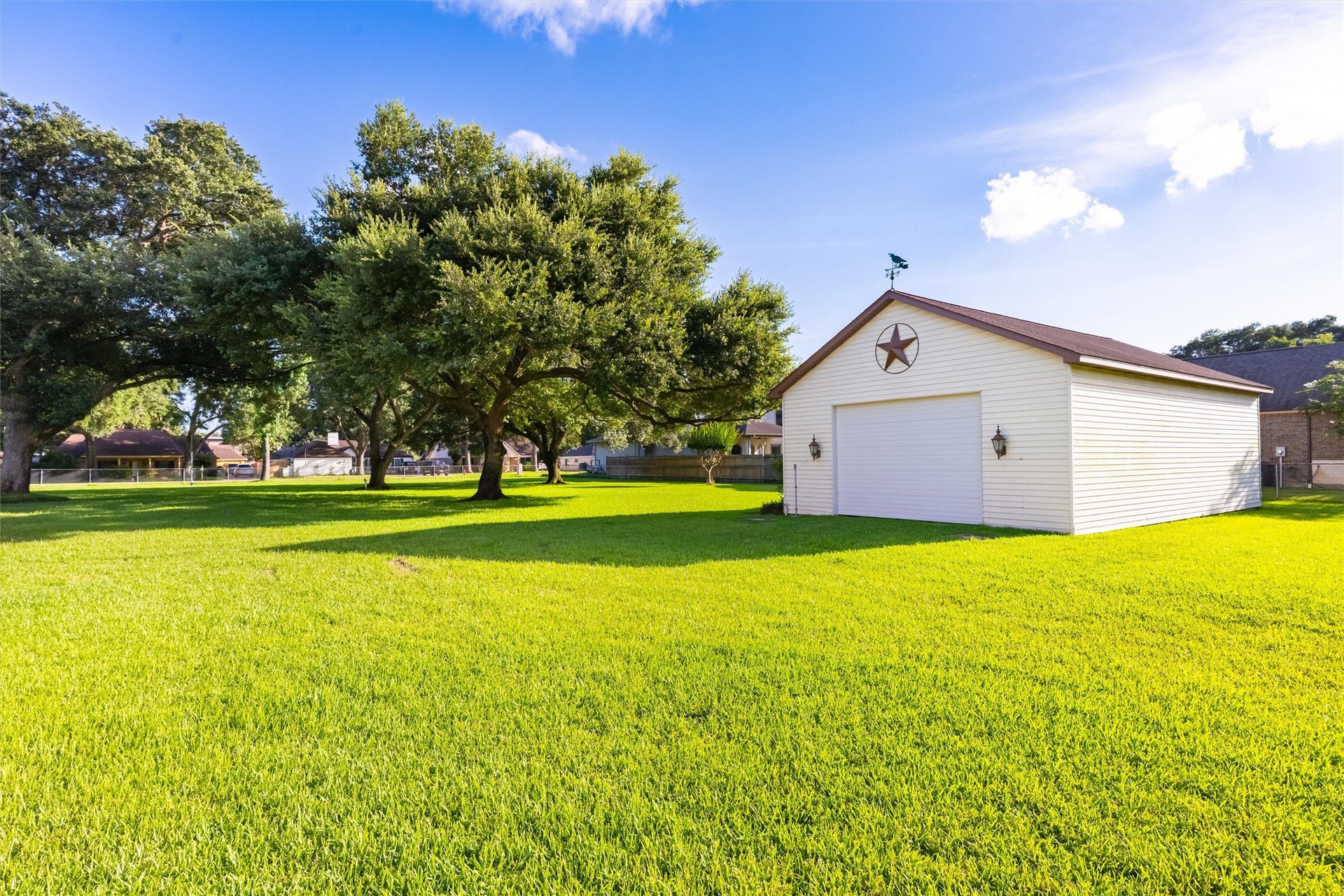1715 Avenue D, Katy, TX 77493 The impressive 41' 26' detached barn adds outstanding versatility to the estate, offering generous space for storage, trailers, equipment, and hobbies.