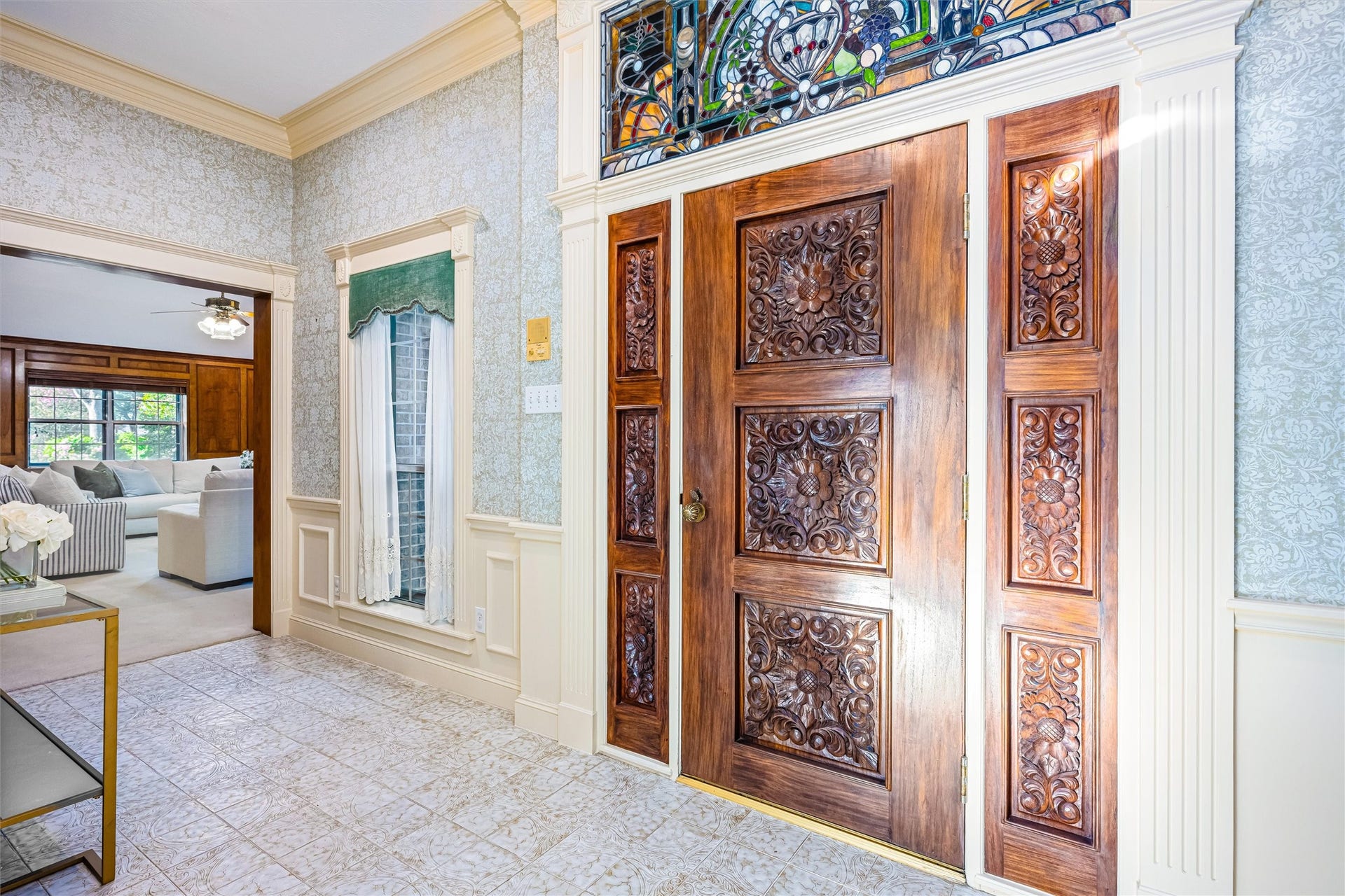 1715 Avenue D, Katy, TX 77493 Imported Italian tile and timeless architectural details create an elegant transition between the formal and casual living areas.