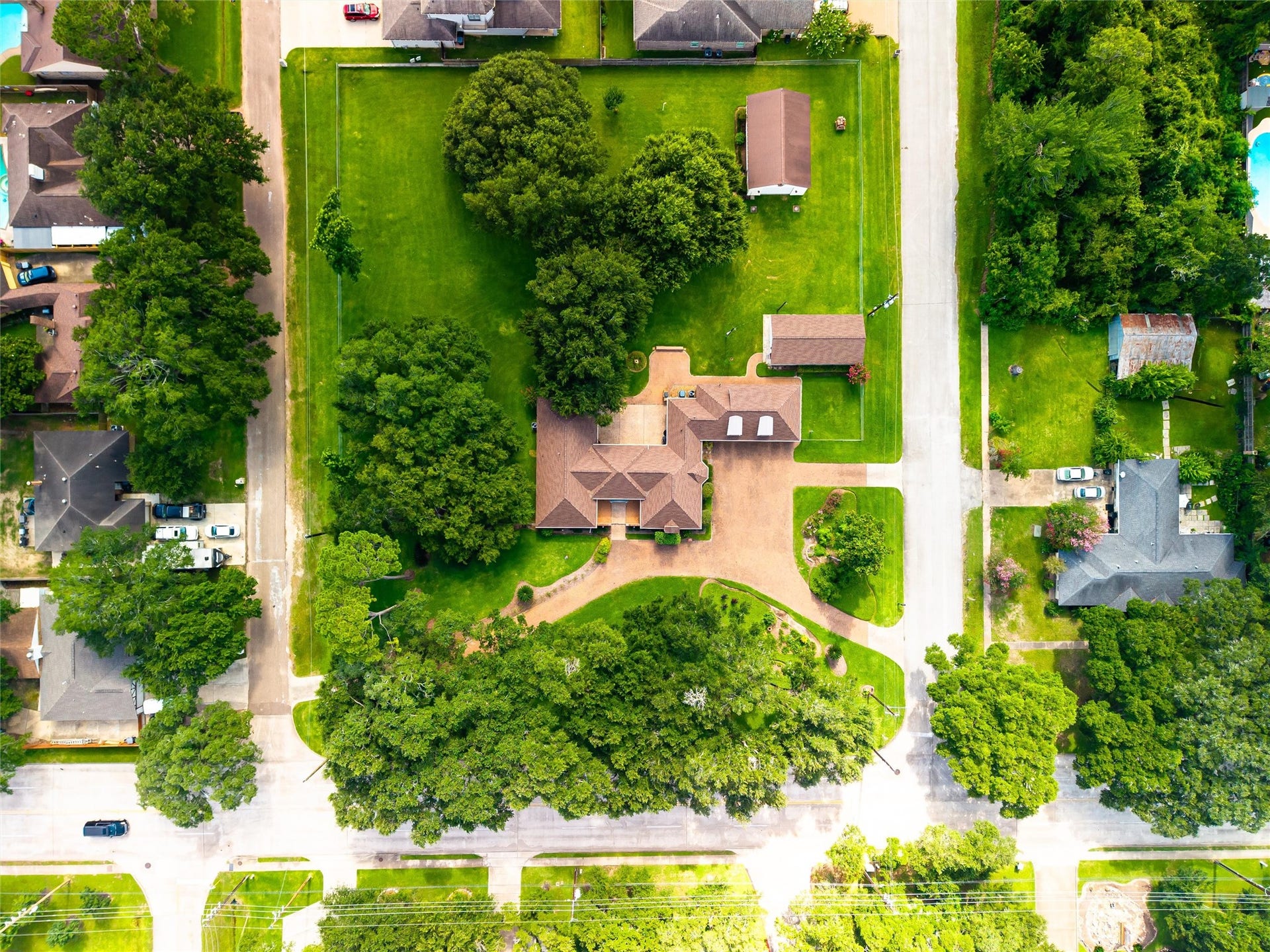 1715 Avenue D, Katy, TX 77493 An aerial perspective showcases the incredible 1.71-acre homesite and all it has to offer!