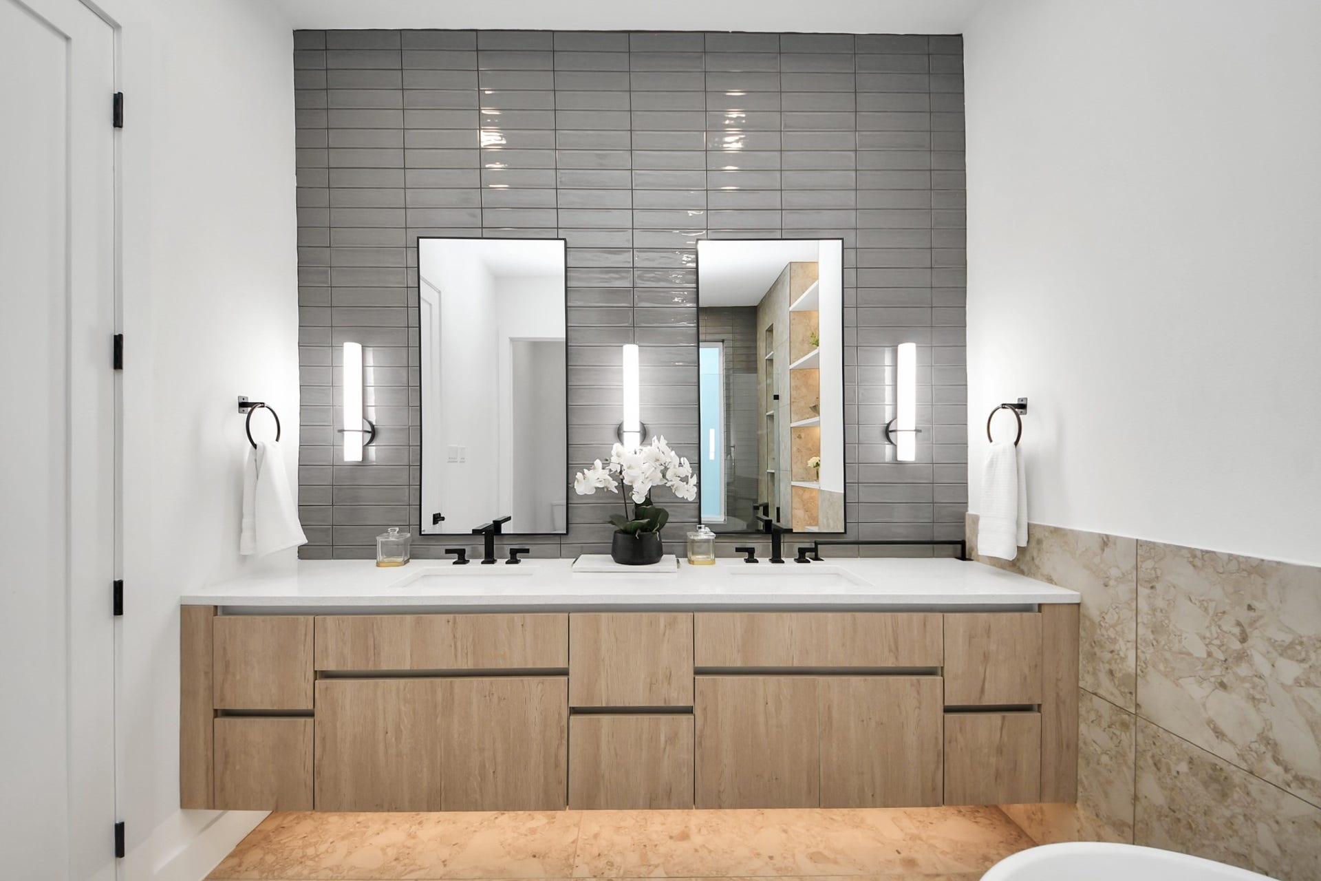 1603 W 25th Street, Houston, TX 77008 Primary bathroom with a spacious double vanity and modern black fixtures.