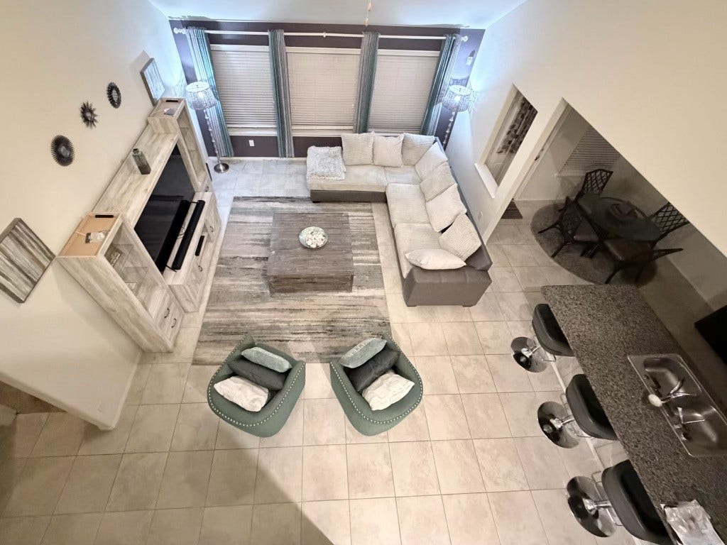 2806 Bretton Woods Drive, Conroe, TX 77301 This inviting living area offers a perfect blend of comfort and style, featuring an open layout with ample seating and a cozy atmosphere.
