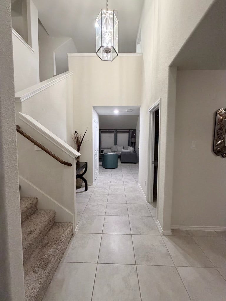 2806 Bretton Woods Drive, Conroe, TX 77301 Step into a breathtaking entryway with soaring ceilings that instantly elevate your home's grandeur.