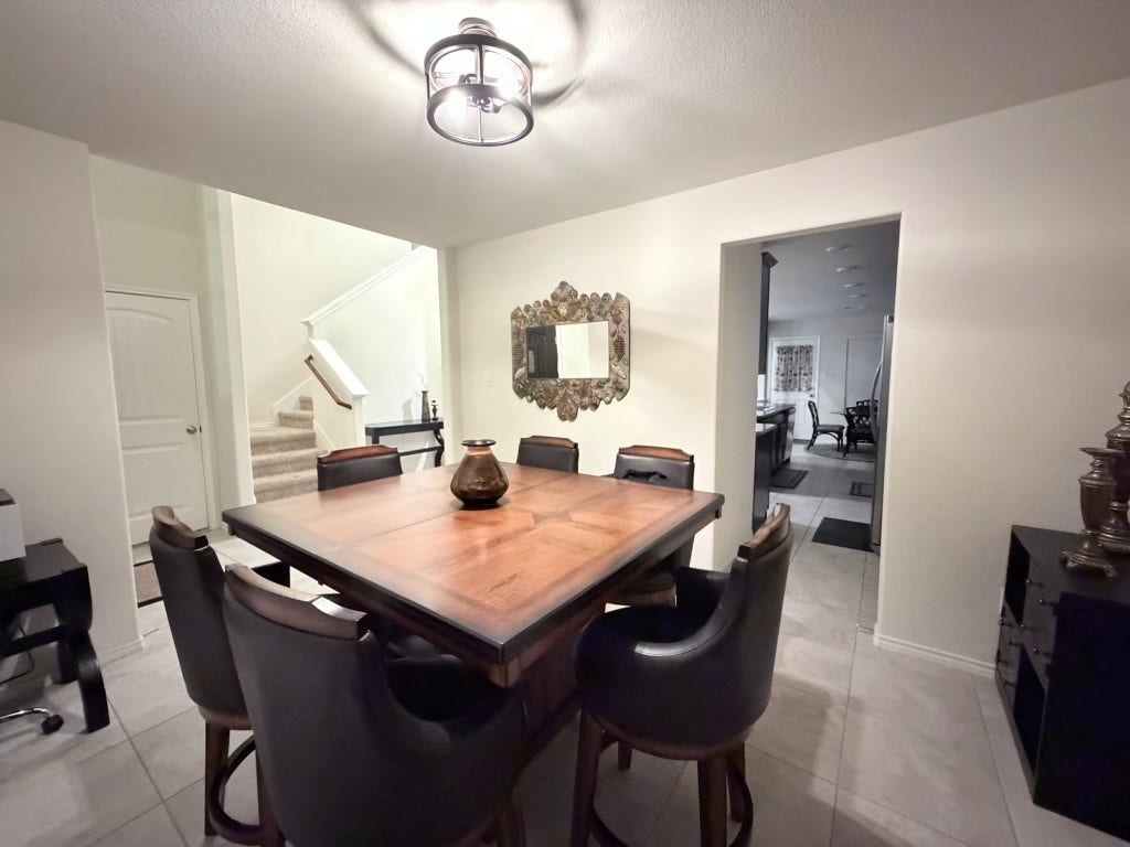 2806 Bretton Woods Drive, Conroe, TX 77301 Savor delightful dinners in this inviting dining space, perfect for memorable gatherings and cozy meals.