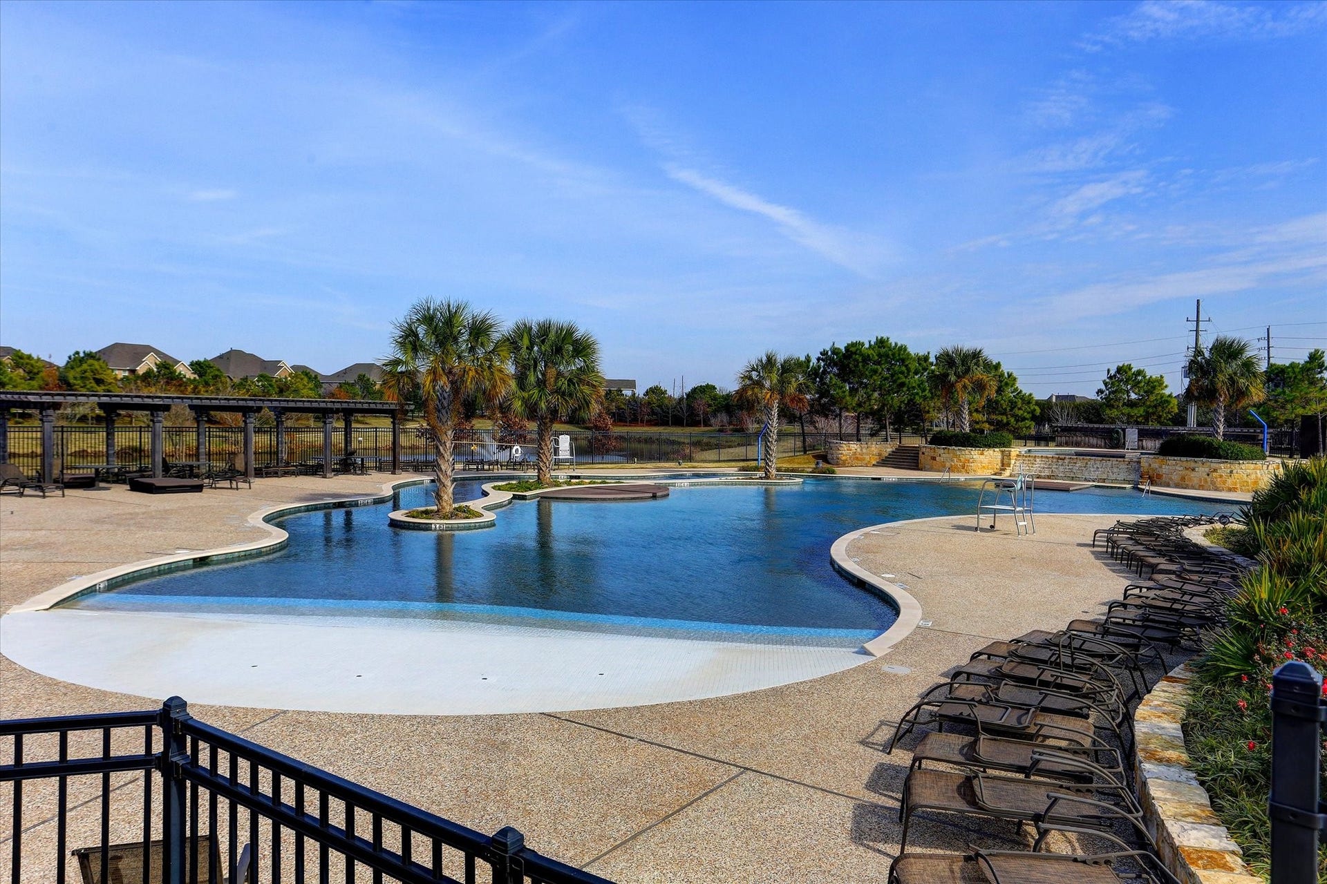 11127 Glasgill Court, Richmond, TX 77407 Relax by the resort-style pool with plenty of lounge seating