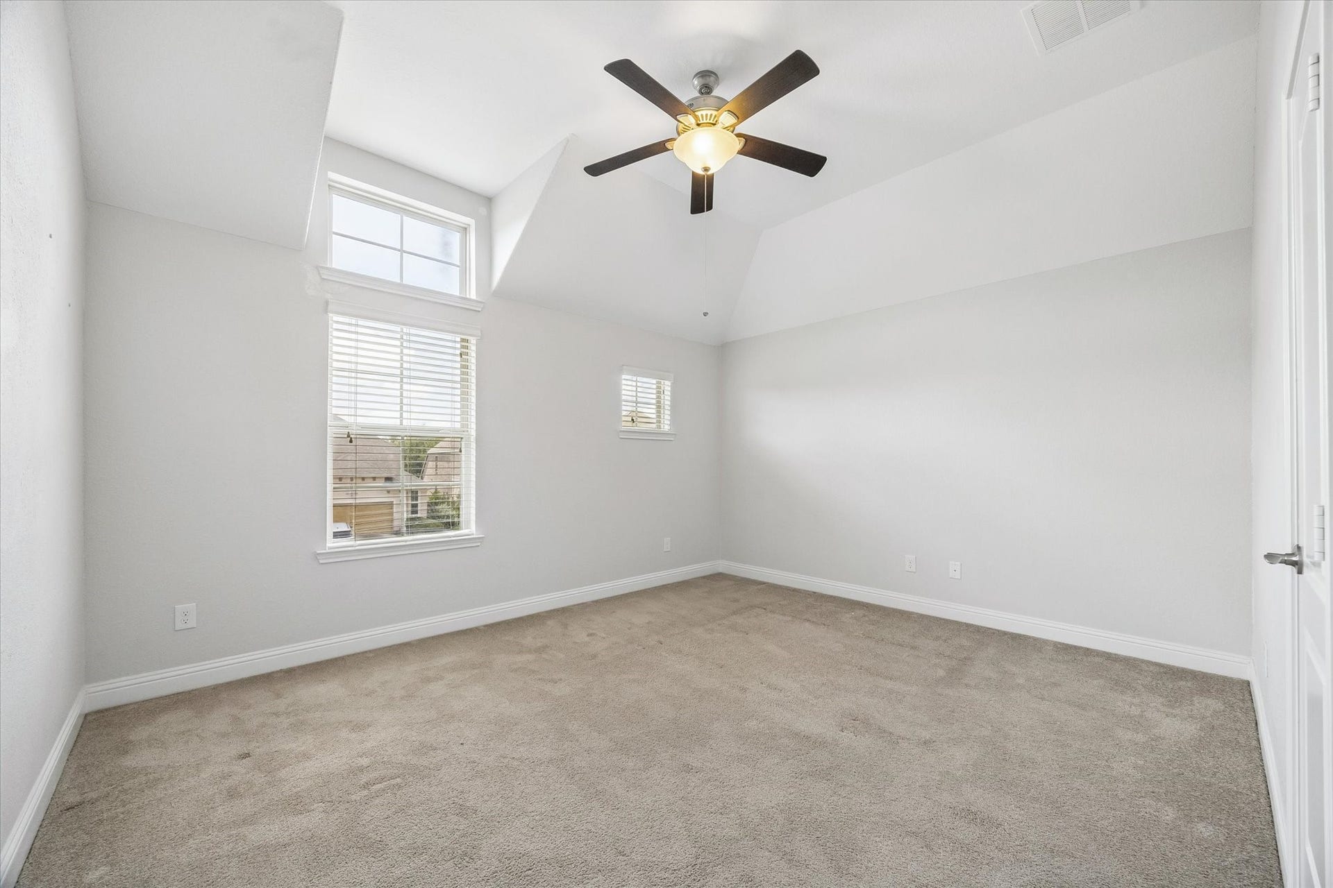 11127 Glasgill Court, Richmond, TX 77407 Second Bedroom: Comfortable bedroom with large windows and neutral finishes