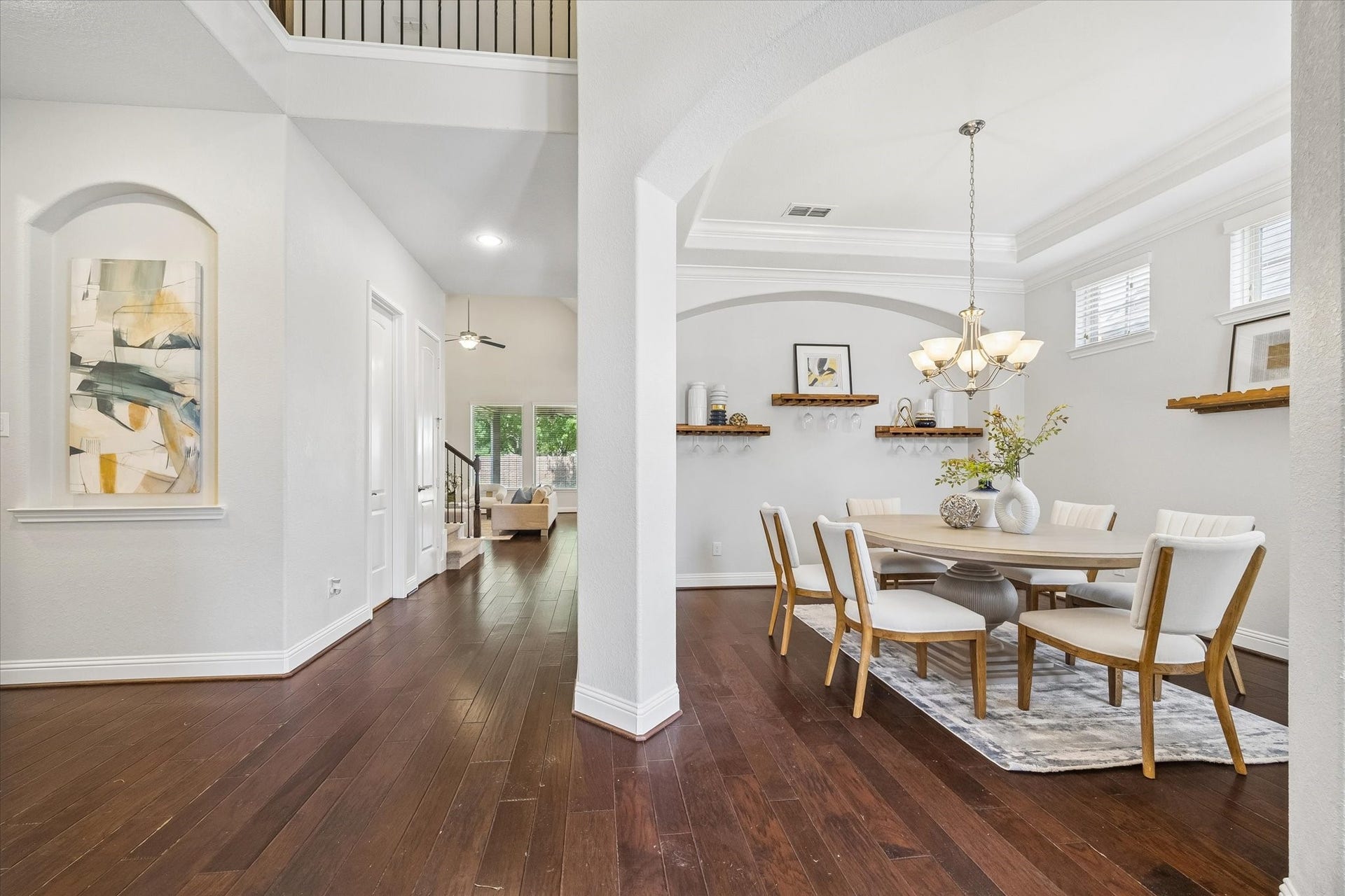11127 Glasgill Court, Richmond, TX 77407 Inviting interior entryway leading to a spacious dining area ideal for family meals and entertaining