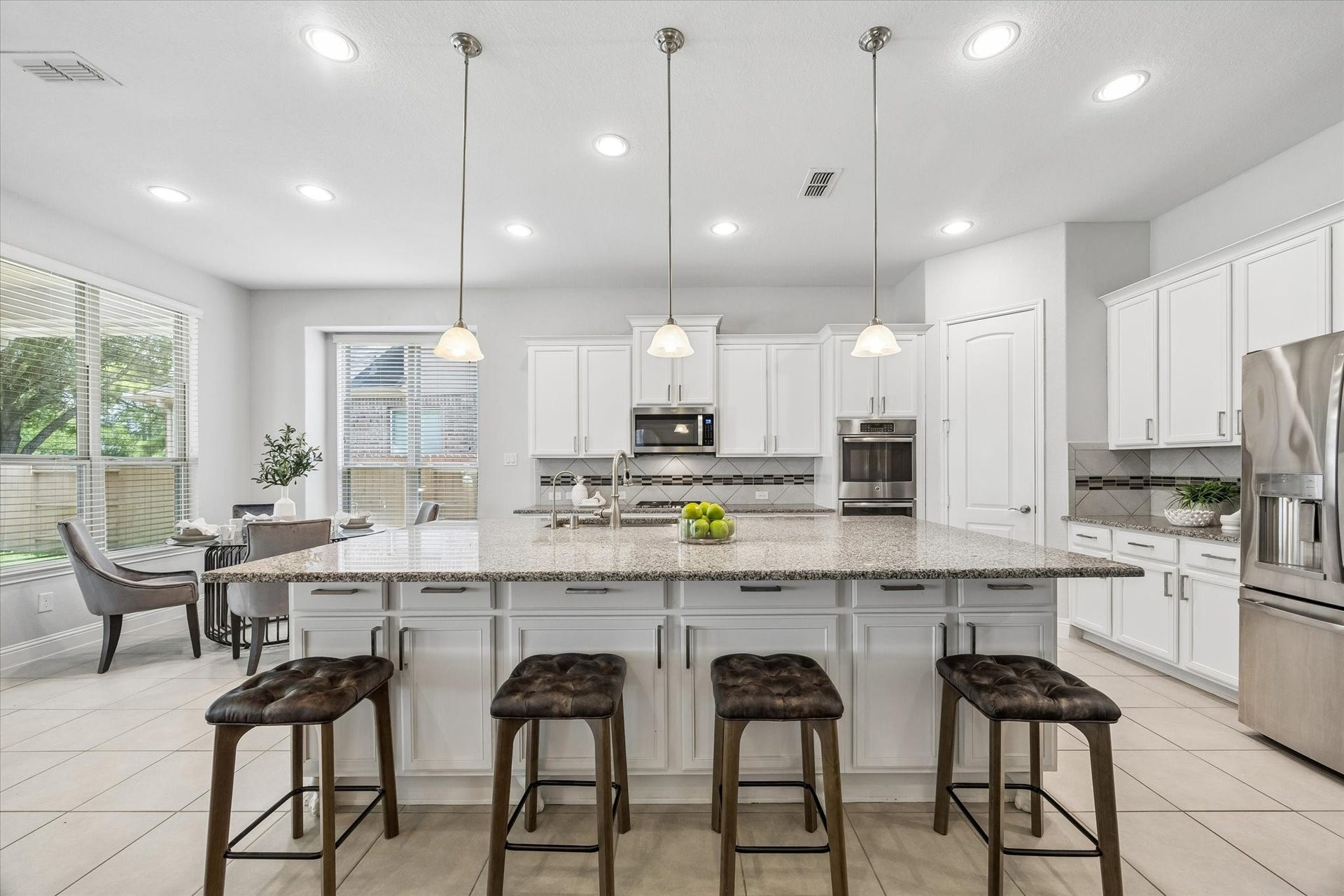 11127 Glasgill Court, Richmond, TX 77407 Chef's Kitchen with Large island, abundant cabinetry, and generous prep space