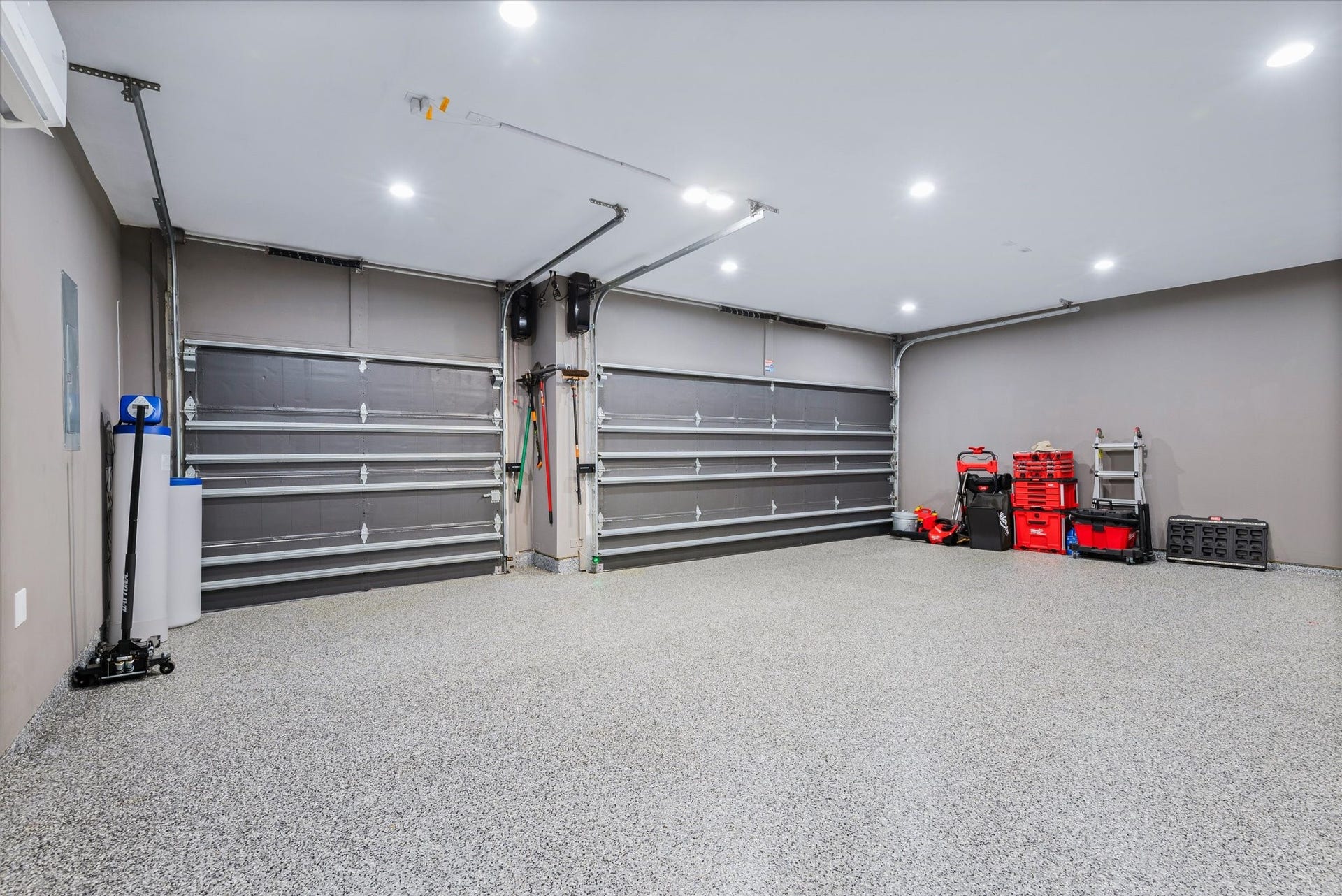 Conditioned garage space with water softener