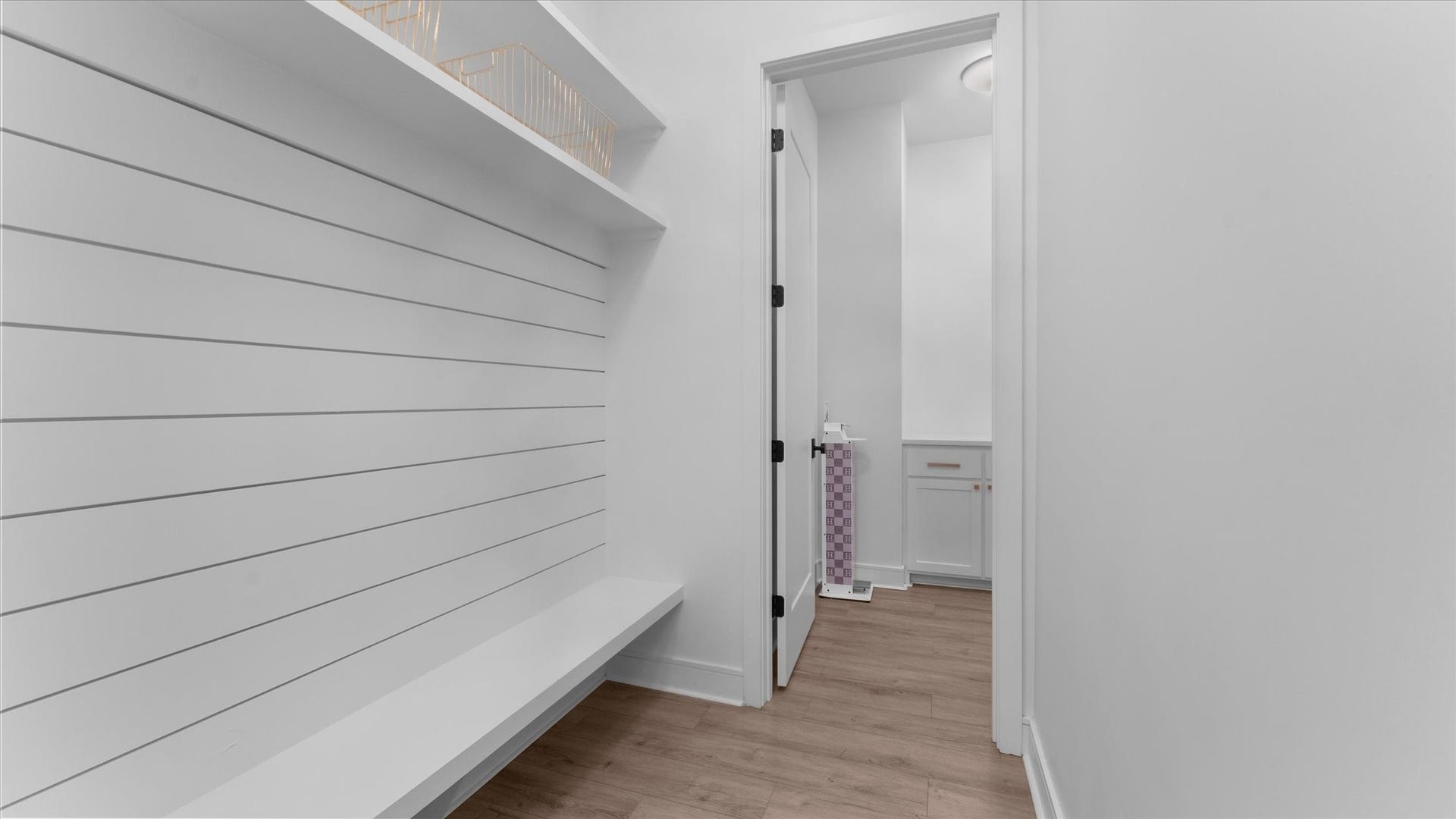 Drop zone/MUD room next to the garage & first floor laundry room.