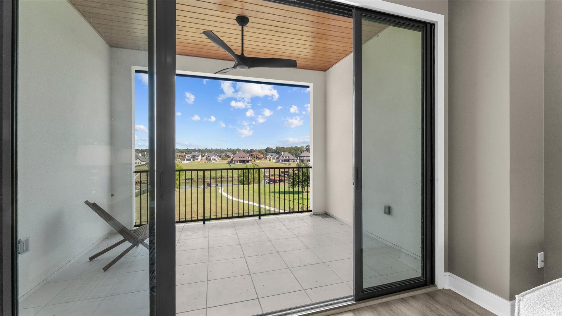 Your own private balcony overlooking the back yard oasis.