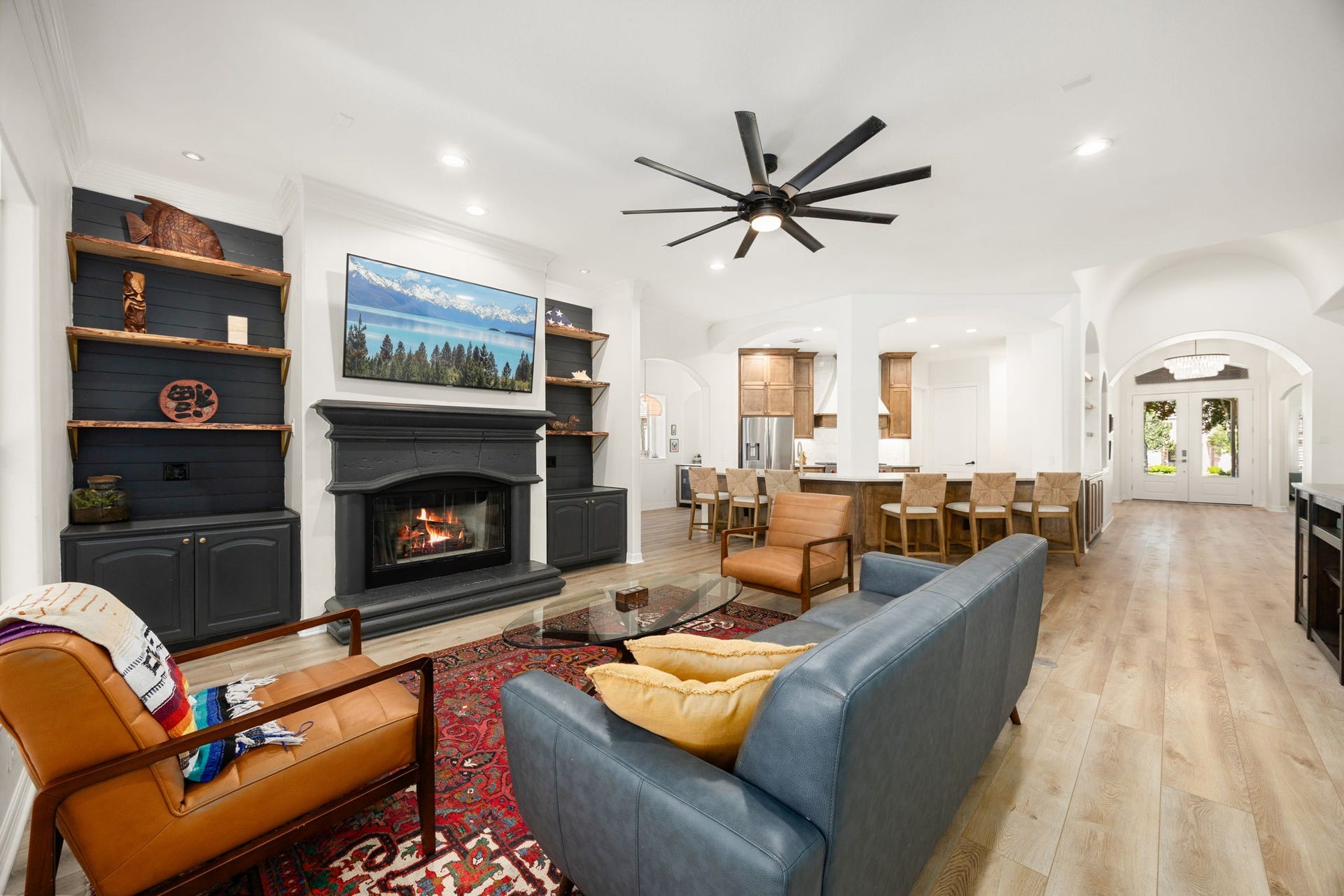 4719 Oxbow Circle W, Fulshear, TX 77441 The Family Room is a Great Place to Relax Around the Fireplace.