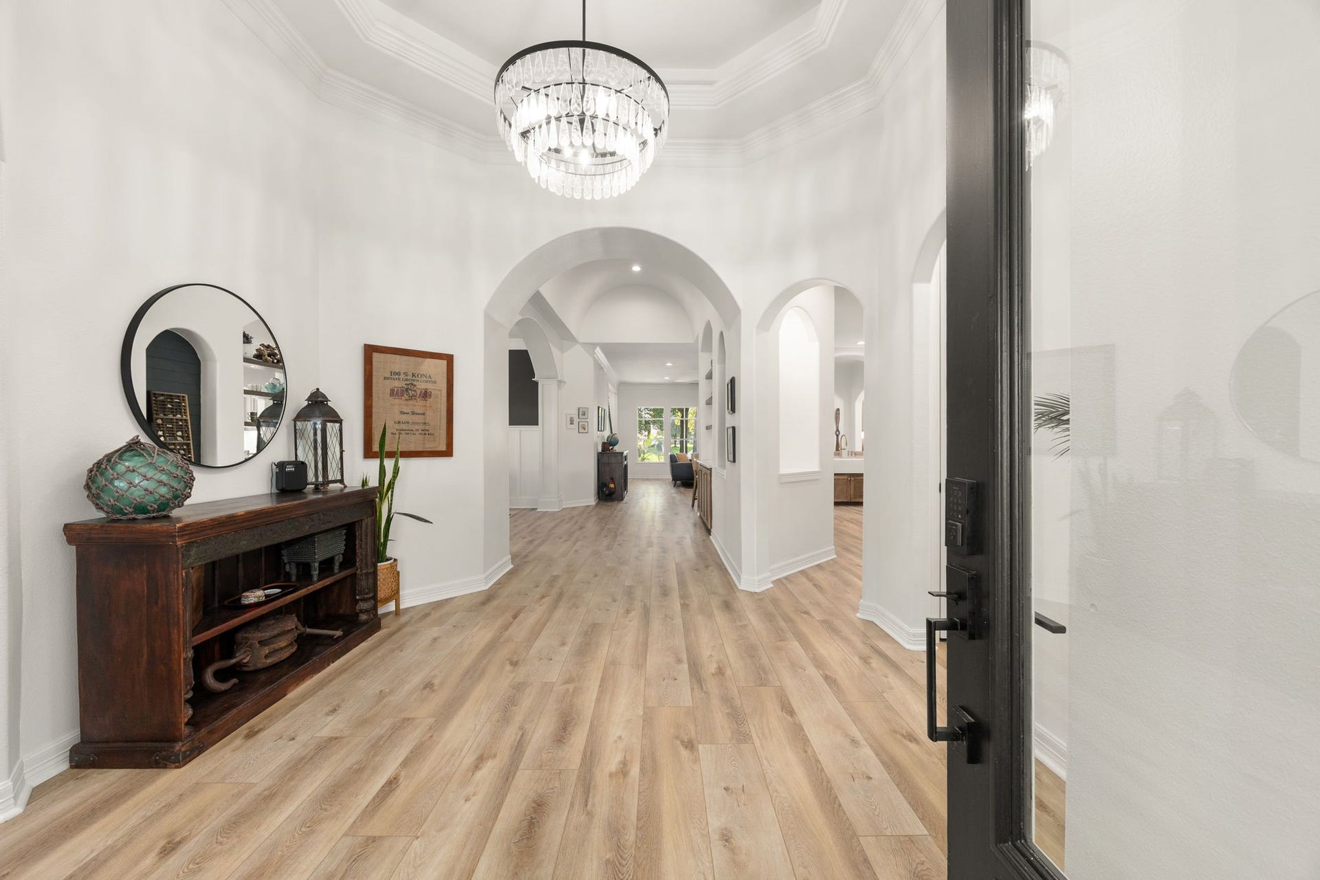 4719 Oxbow Circle W, Fulshear, TX 77441 Front Entryway With Beautiful Tray Ceilings, Double Crown Molding, and Chandelier