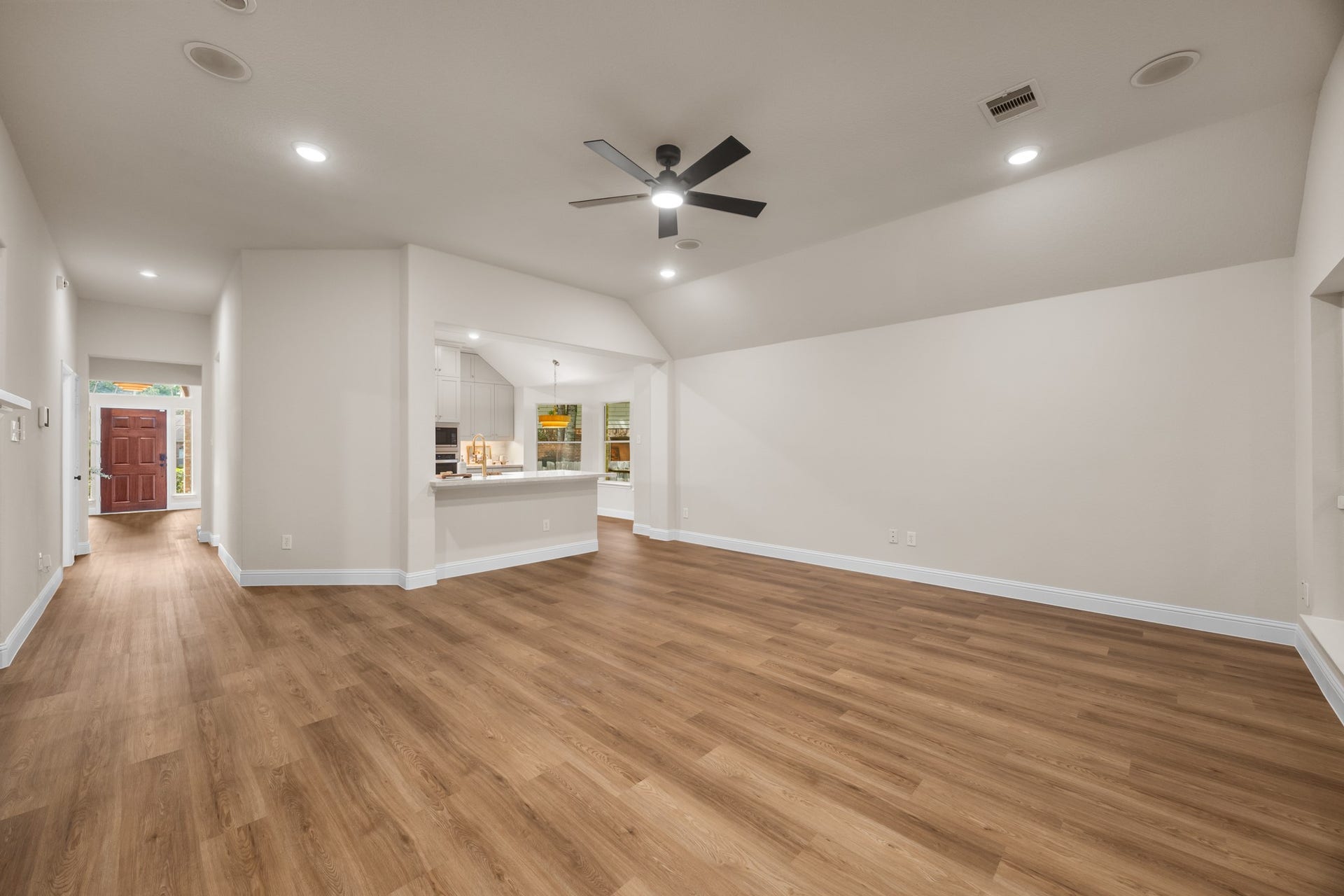 2 Gilded Crest Court, The Woodlands, TX 77382 Open Concept Living area leading into the dining room.