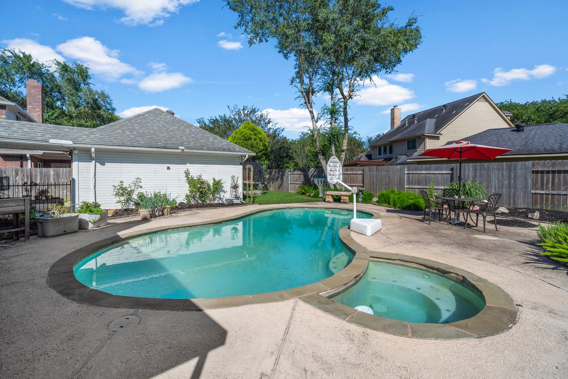 3407 Autumn Bend Drive, Sugar Land, TX 77479 Just in time for summer, refreshing pool and spa.