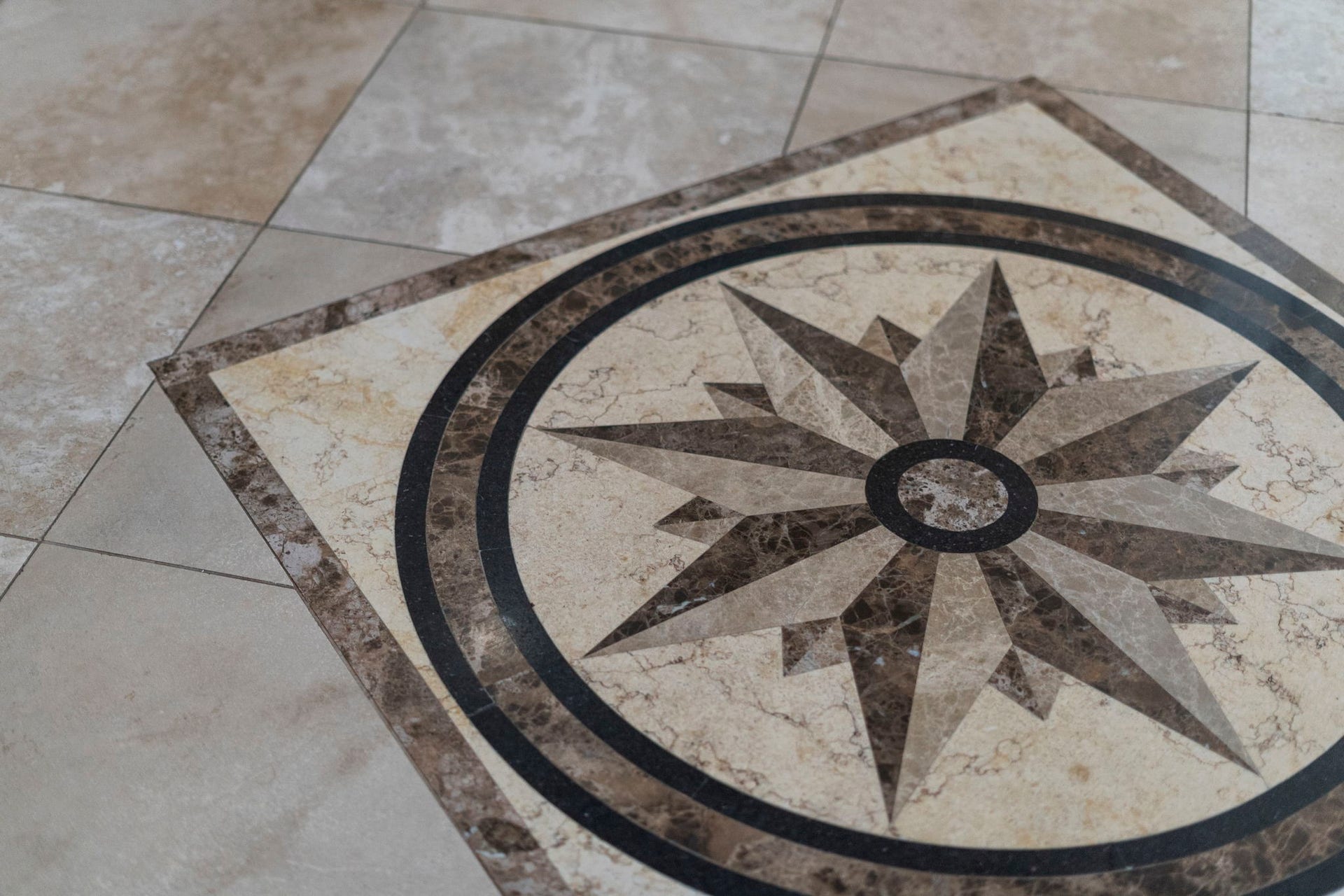 3407 Autumn Bend Drive, Sugar Land, TX 77479 A nautical compass rose mosaic tile inlay creates a striking and memorable statement in the home's entryway, setting a stylish tone from the moment you step inside.