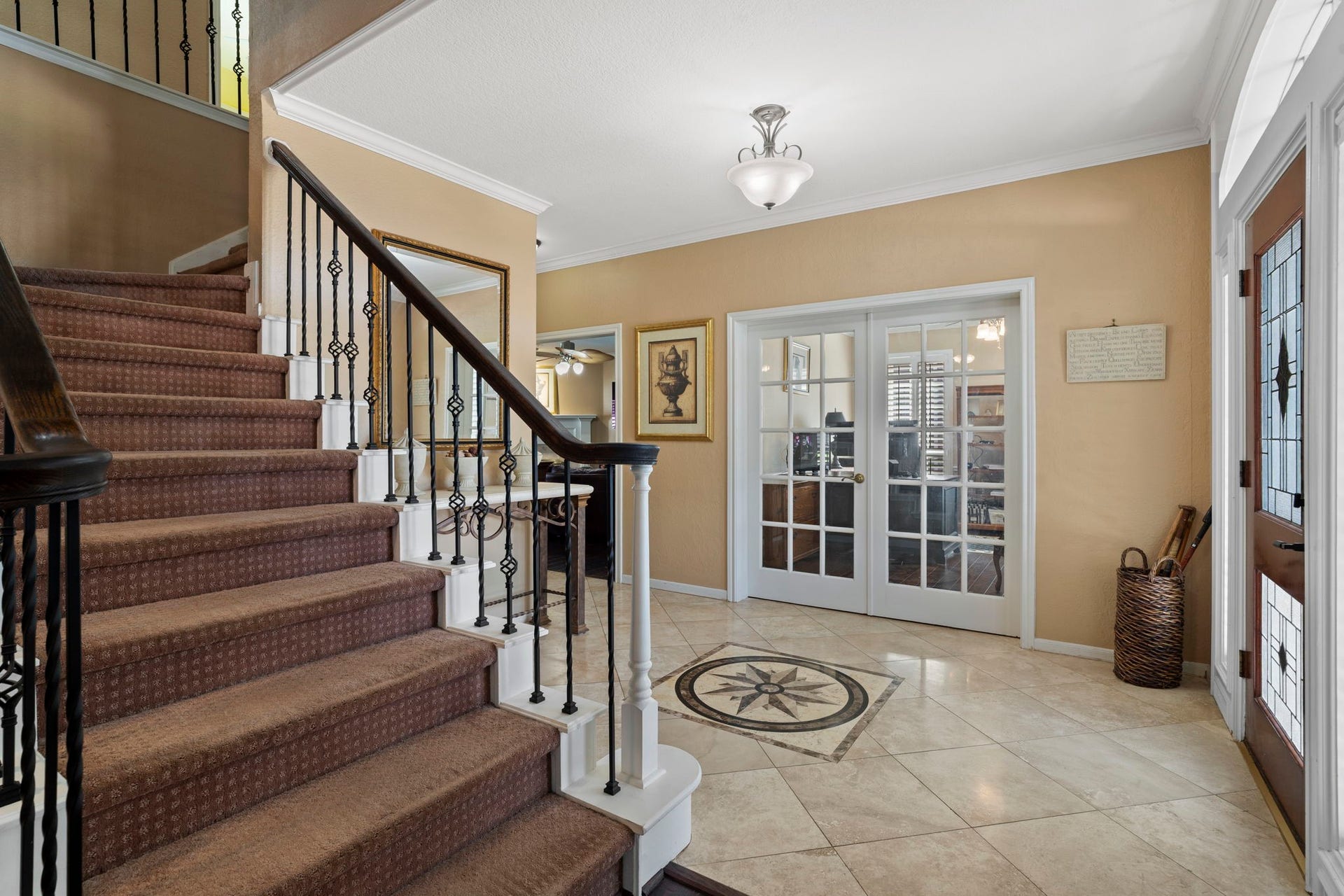 3407 Autumn Bend Drive, Sugar Land, TX 77479 The home office is conveniently located just as you enter the home, offering easy access while maintaining a sense of separation. Elegant French doors provide added privacy, making it an ideal space for focused work or quiet study.
