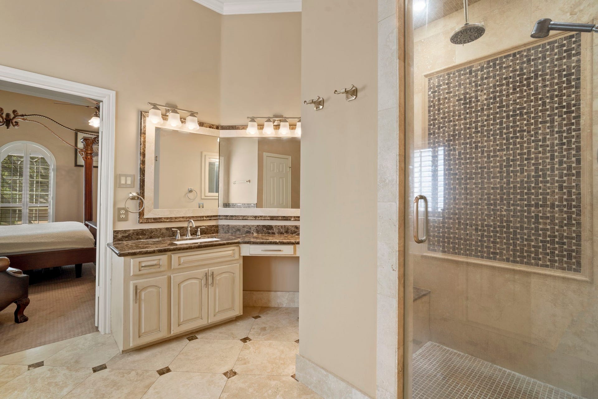 3407 Autumn Bend Drive, Sugar Land, TX 77479 Take a peek inside the shower, complete with dual shower heads and a built-in seat.