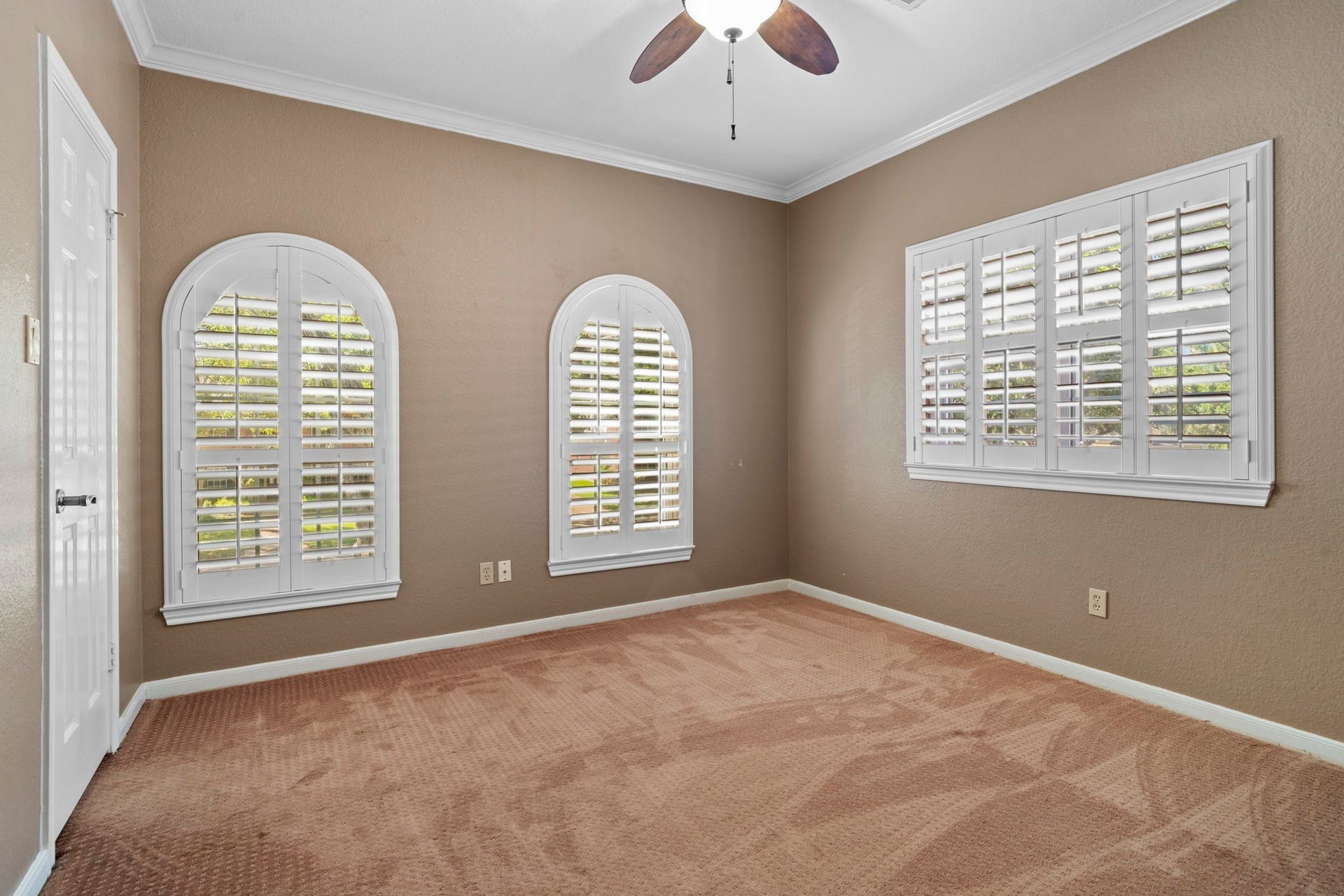 3407 Autumn Bend Drive, Sugar Land, TX 77479 All windows are fitted with custom plantation shutters, offering timeless style along with adjustable privacy and shade as needed.