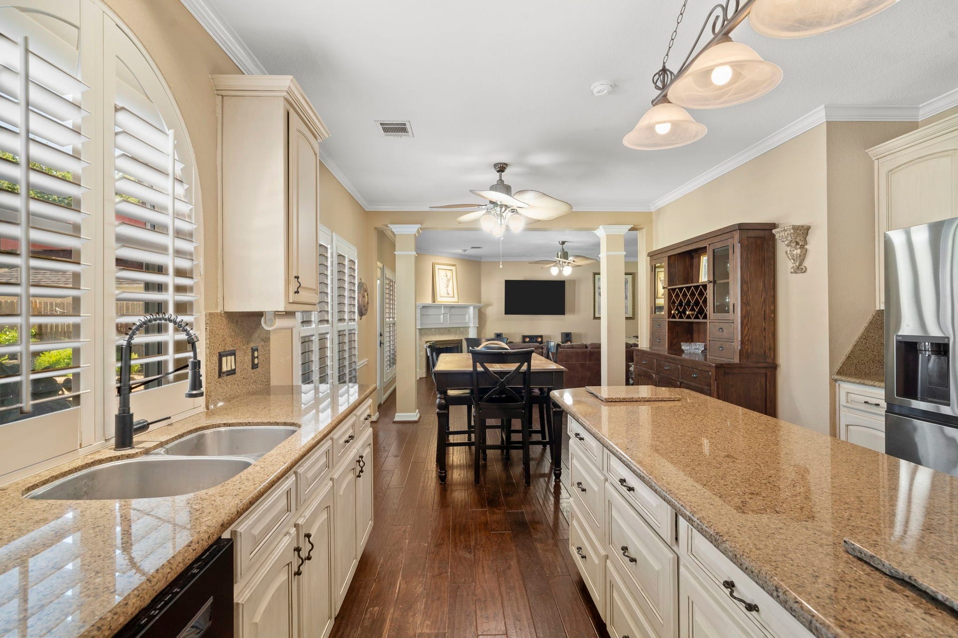 3407 Autumn Bend Drive, Sugar Land, TX 77479 Smartly designed kitchen features a large center island with expansive counter space and loads of storage.