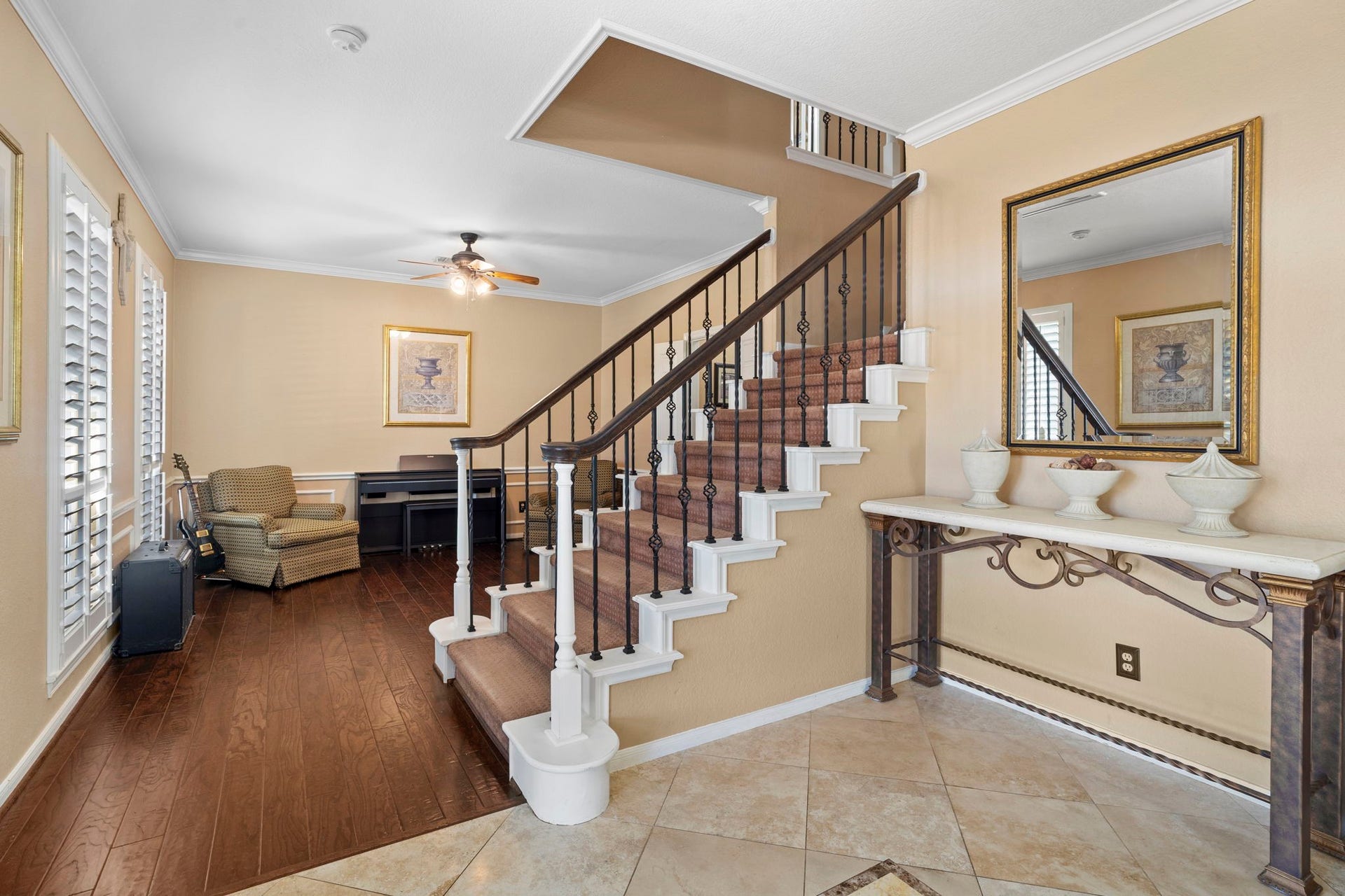 3407 Autumn Bend Drive, Sugar Land, TX 77479 Steps lead to a private living area that houses all the bedrooms and two full bathrooms, offering a secluded retreat within the home.