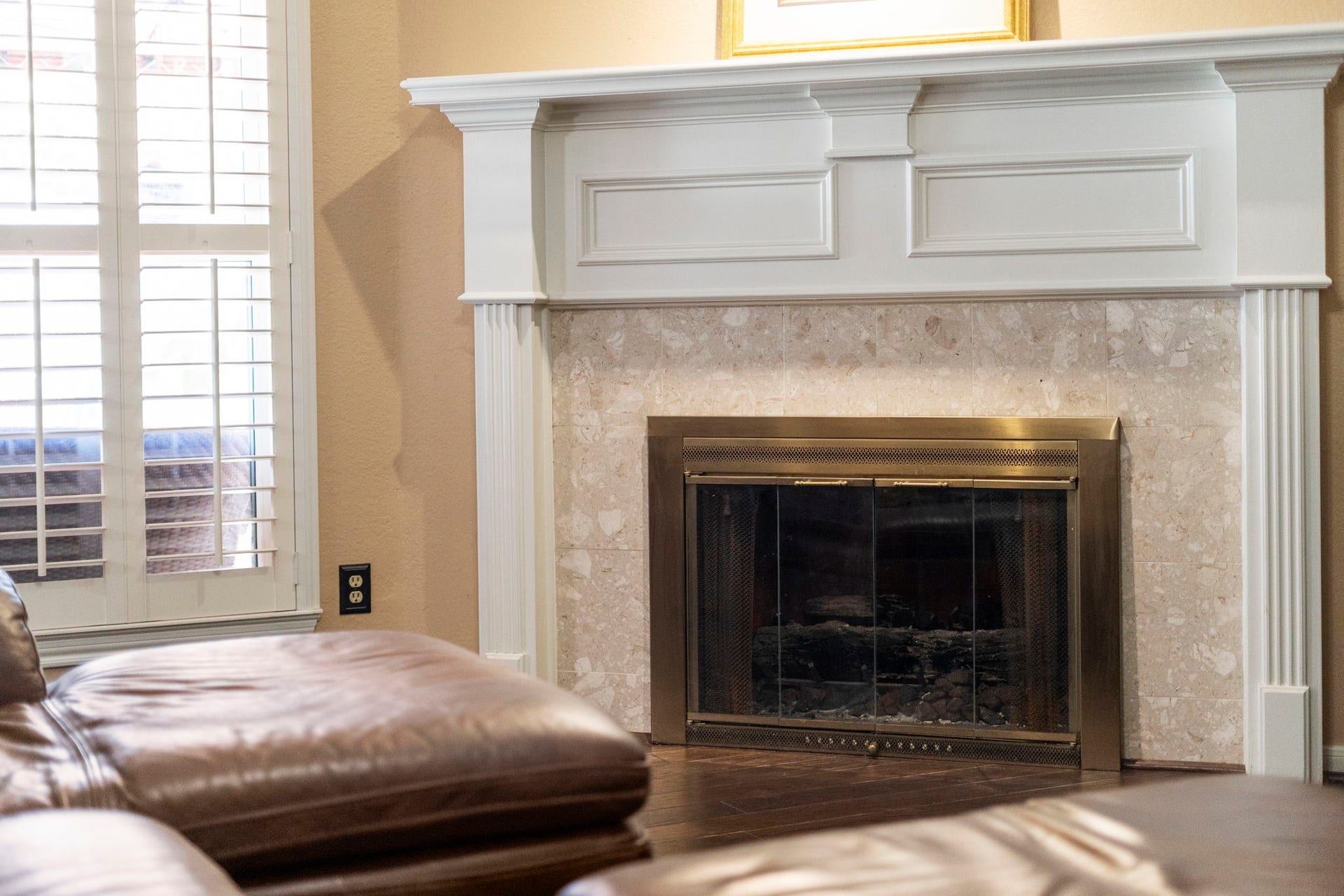 3407 Autumn Bend Drive, Sugar Land, TX 77479 The classically designed fireplace offers timeless appeal, while convenient gas logs provide warmth and ambiance with no maintenance required.