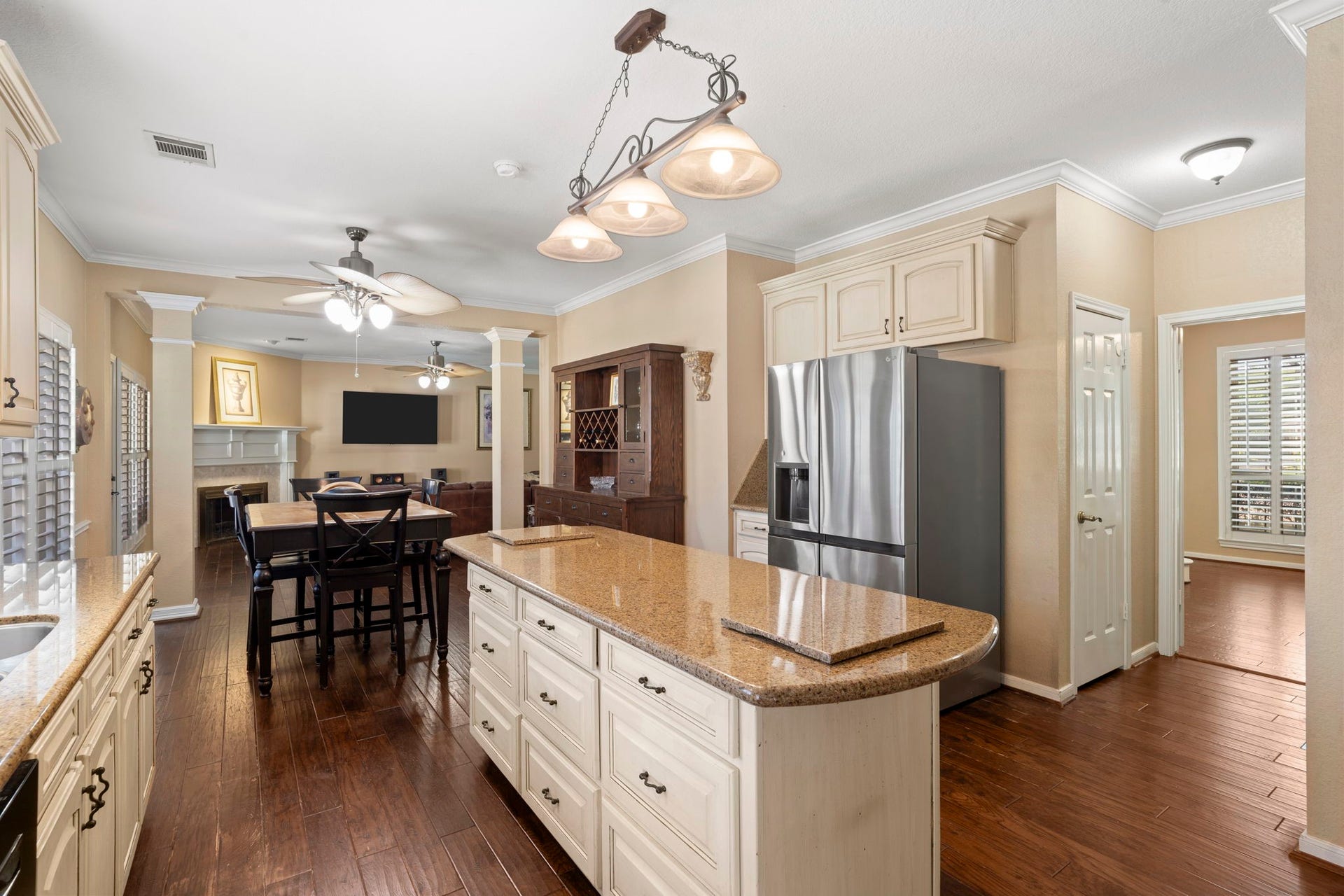 3407 Autumn Bend Drive, Sugar Land, TX 77479 This view highlights the seamless connection between the kitchen and dining room, creating an ideal layout for effortless entertaining and easy flow when hosting guests.