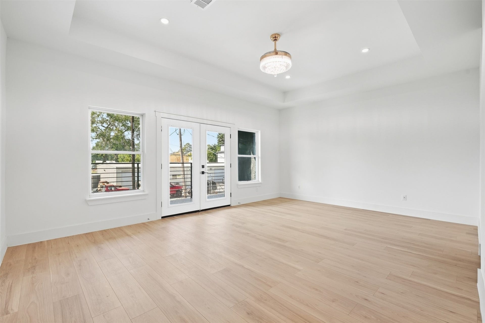 PRIMARY BR W/ BALCONY