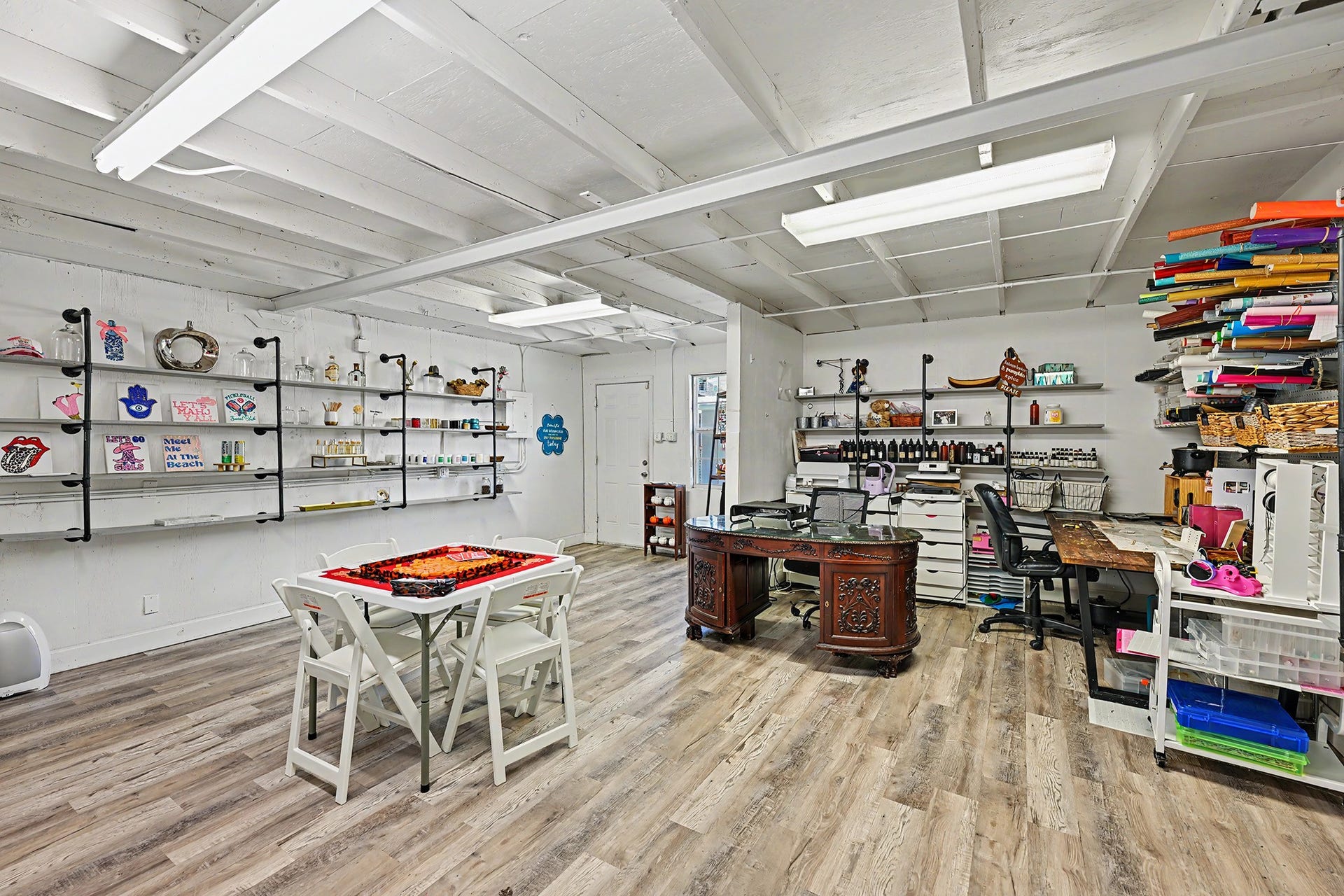 The bonus room adjacent to the two car garage.  Game room. workshop, party room, project central.  There is a split AC unit.