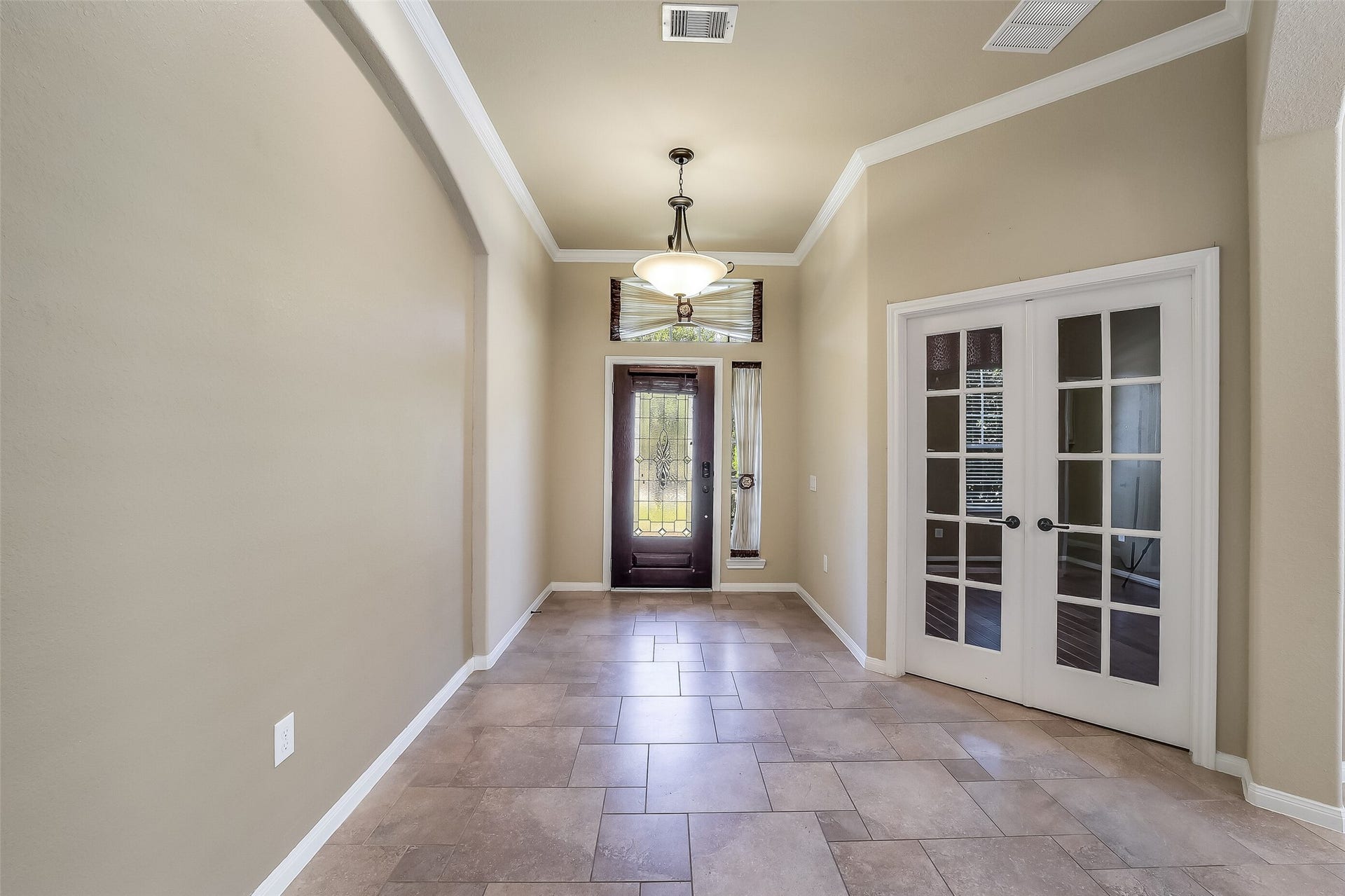 16706 Curio Gray Trail, Cypress, TX 77433 Double French doors at entry hall lead to a private study/library.