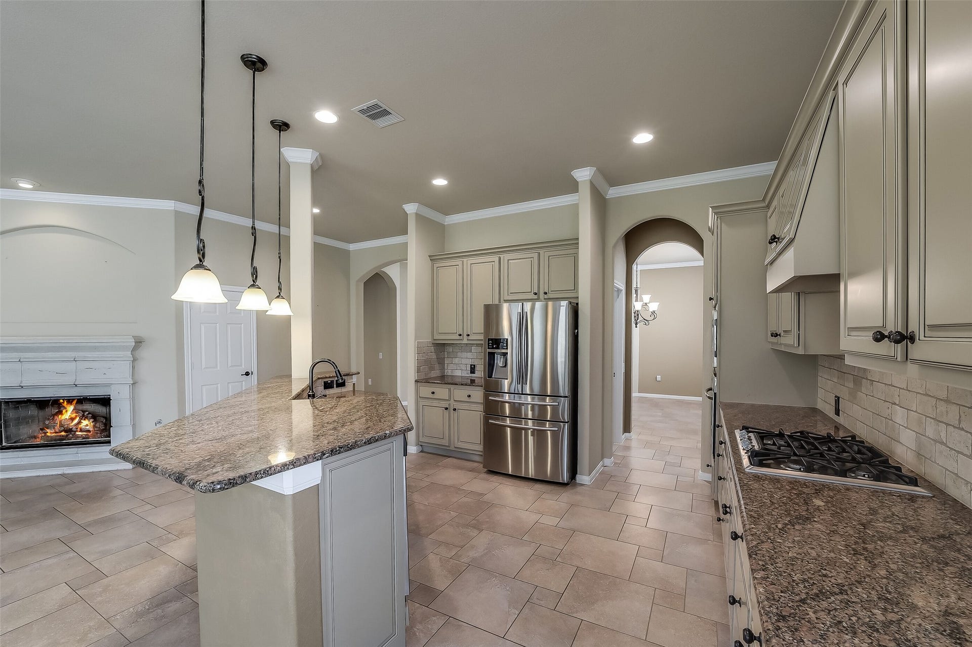 16706 Curio Gray Trail, Cypress, TX 77433 Lots of sleek granite counters, stone back splash and tall cabinets.