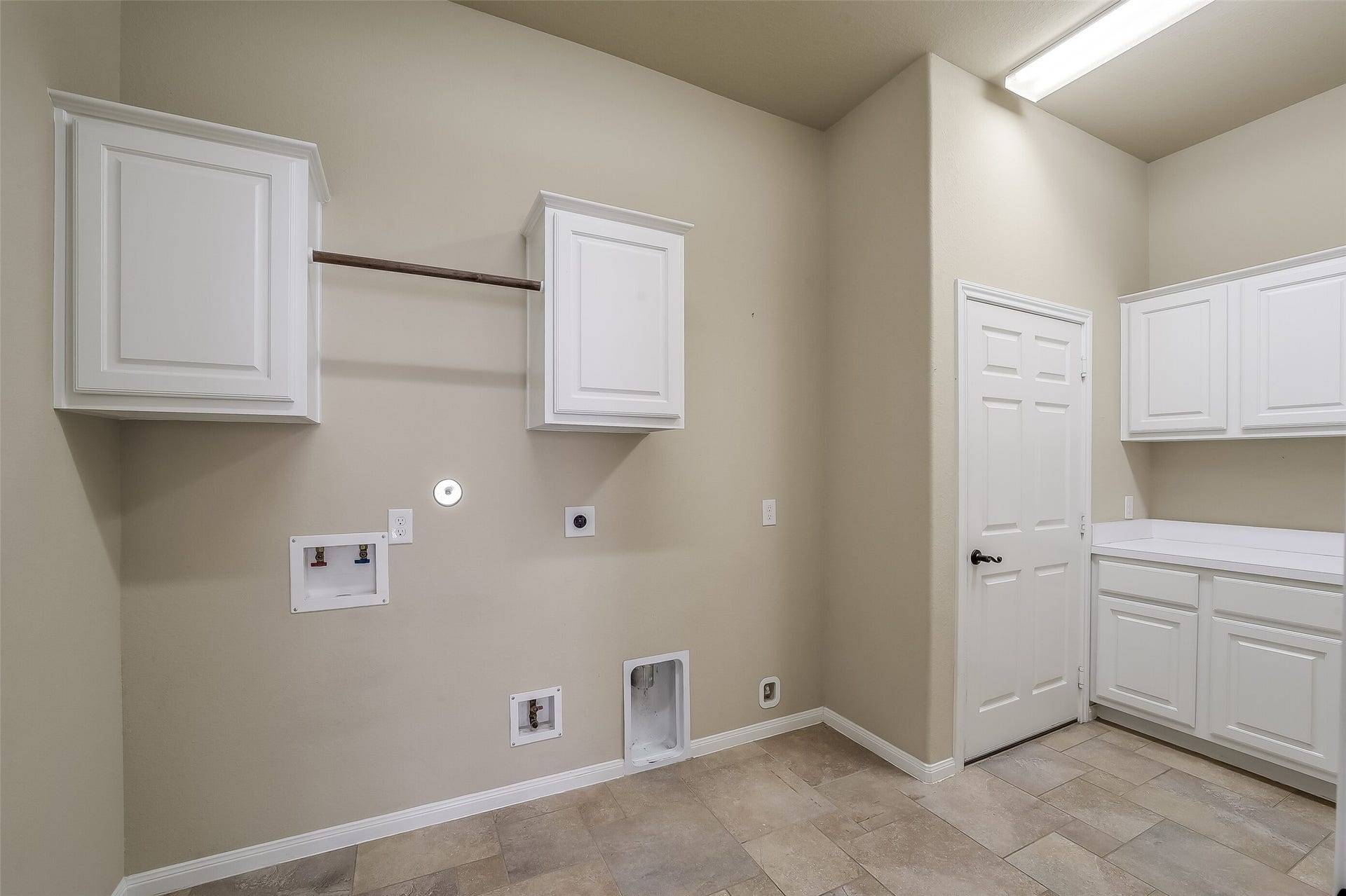 16706 Curio Gray Trail, Cypress, TX 77433 Nice size utility room with gas dryer connection, storage cabinets, counter space and room for an extra refridgerator.