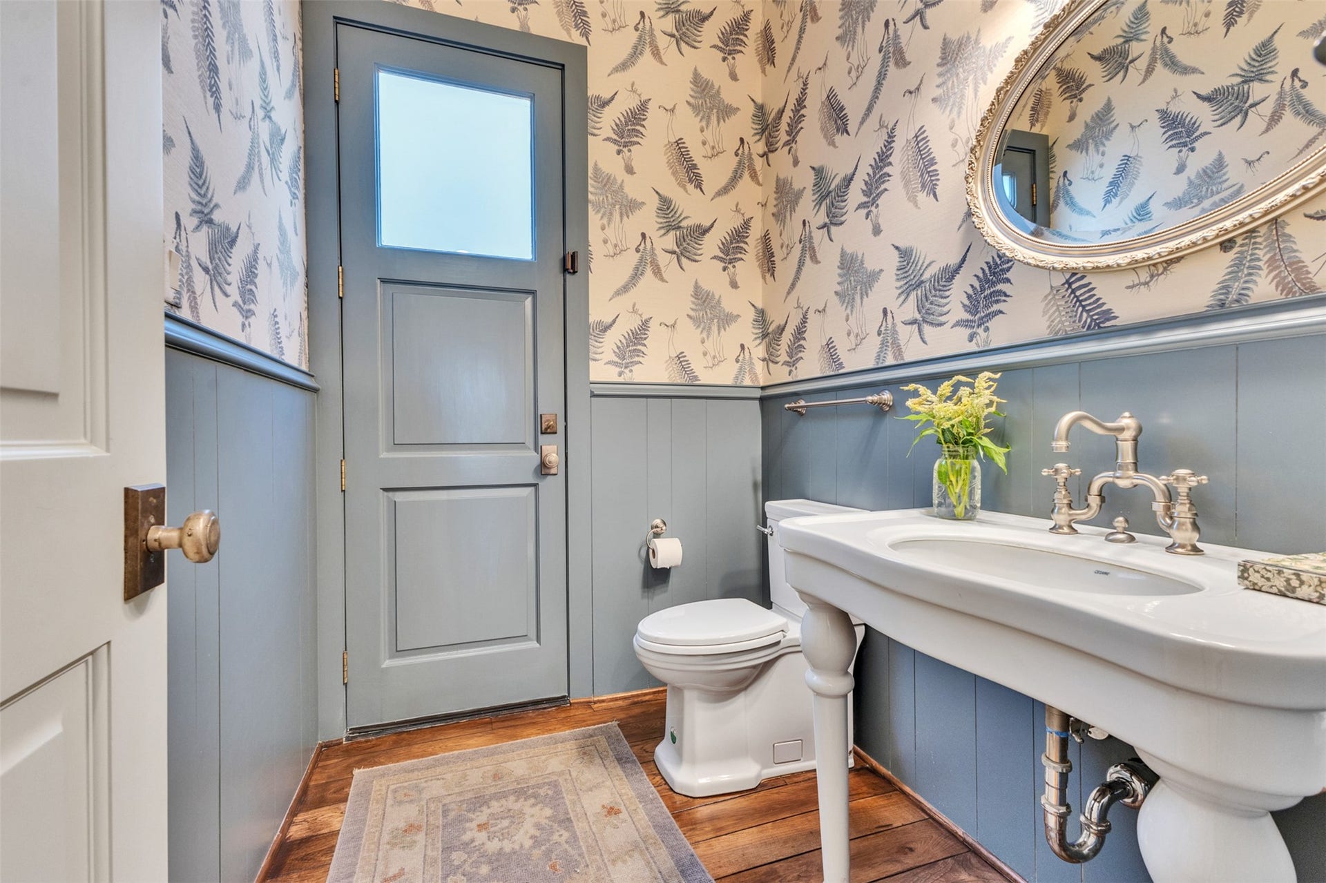 2721 Cason Street, West University Place, TX 77005 Powder bath with wallpaper and pretty paneling