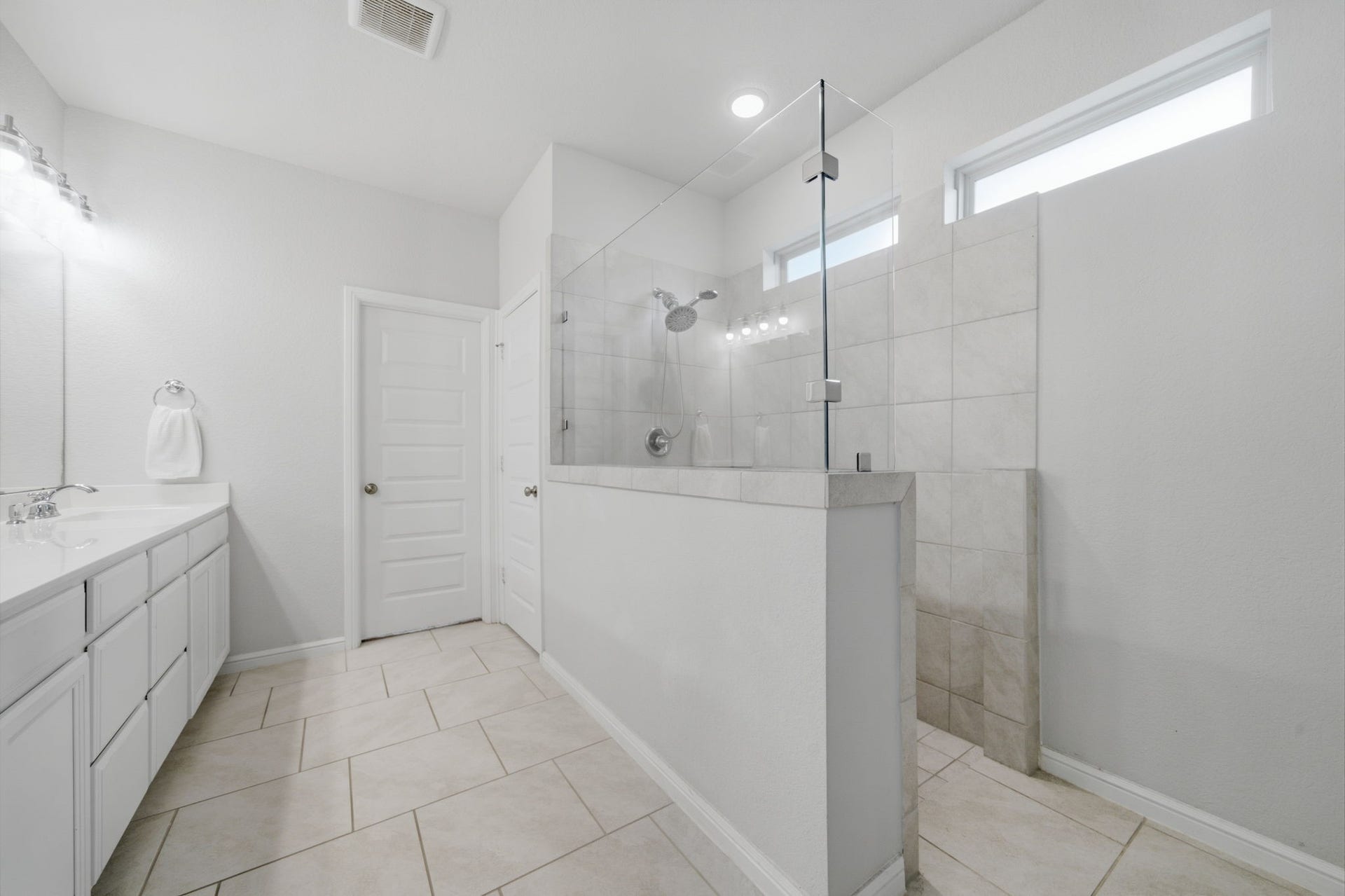 View of the oversized walk-in shower.