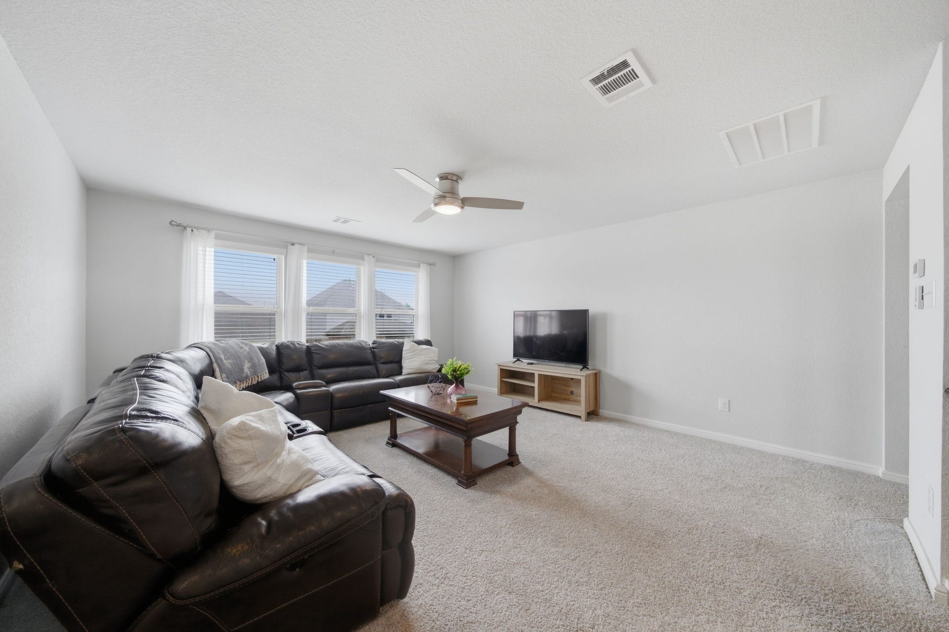 The game room is oversized allowing to use it as a true game room or a lounge space to watch tv, read, or rest.