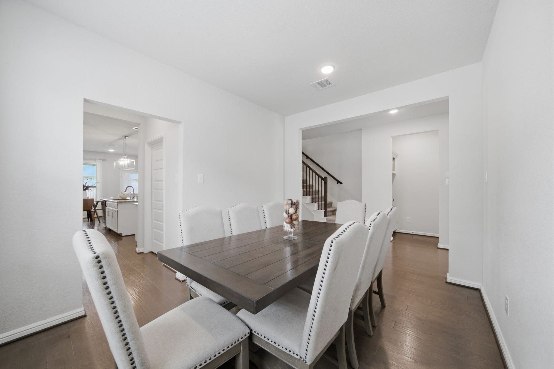 The formal dining room is located off of the foyer, next to the kitchen for easy access.
