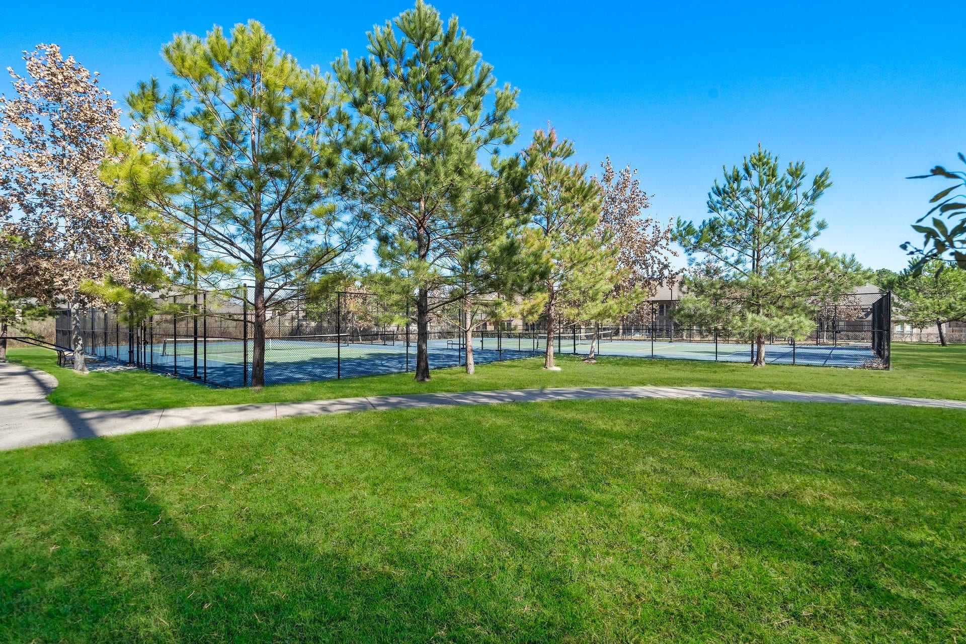 Community tennis/pickle ball courts.
