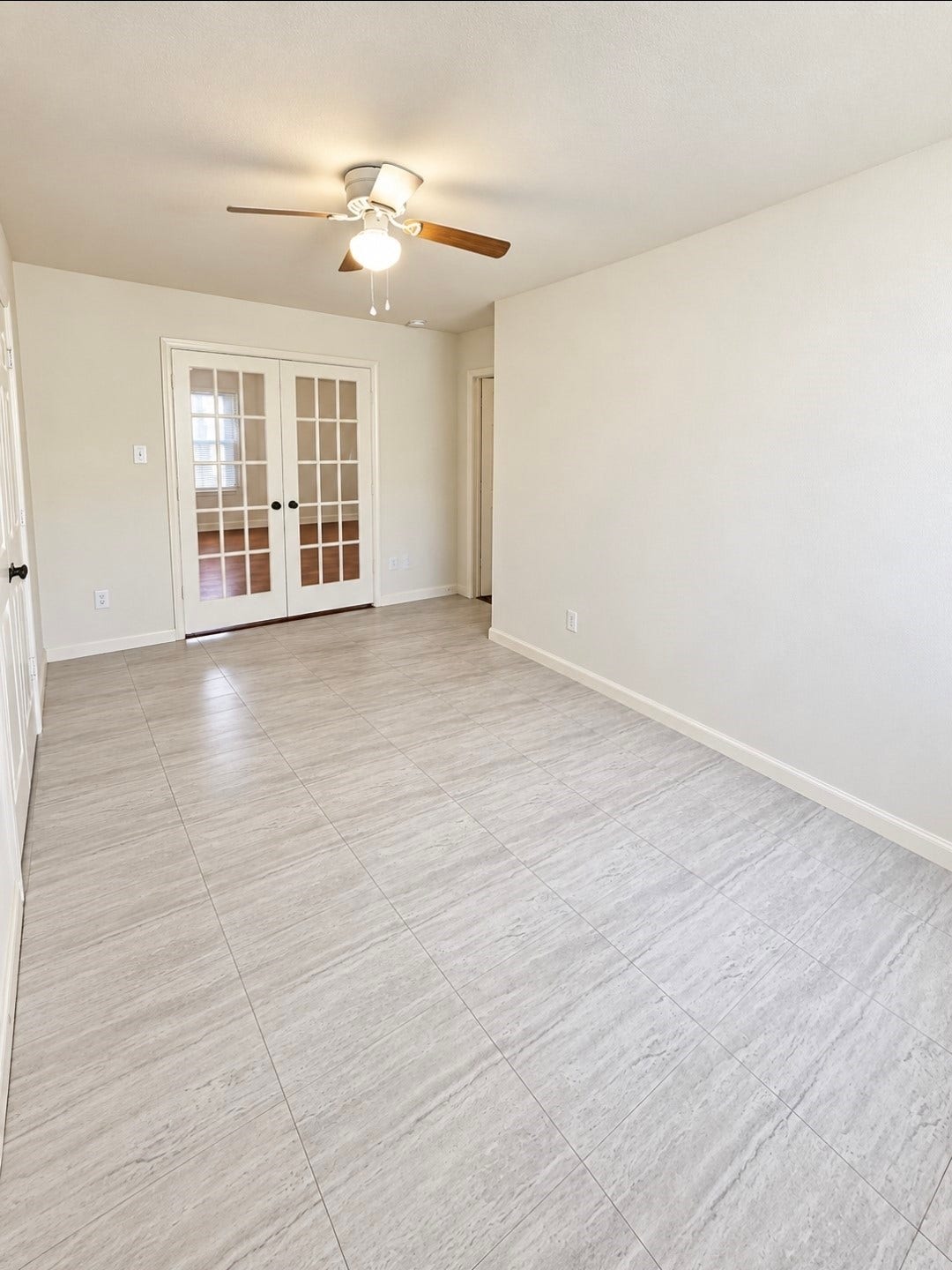 12221 Seacrest Lane, Texas City, TX 77568 Spacious bedroom/office with double doors just off the main living area and hallway.