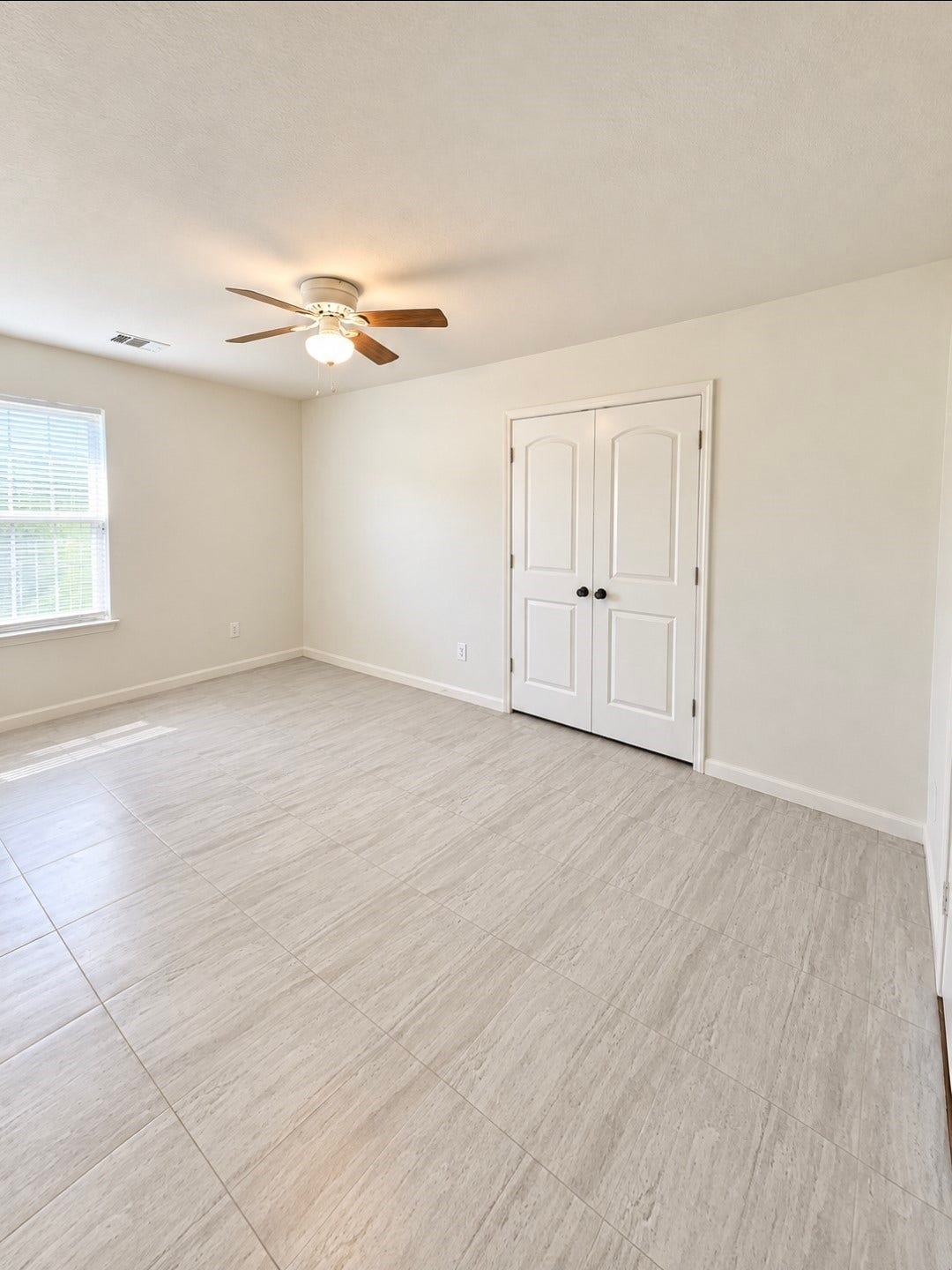 12221 Seacrest Lane, Texas City, TX 77568 Spacious bedroom/office with double doors just off the main living area and hallway.