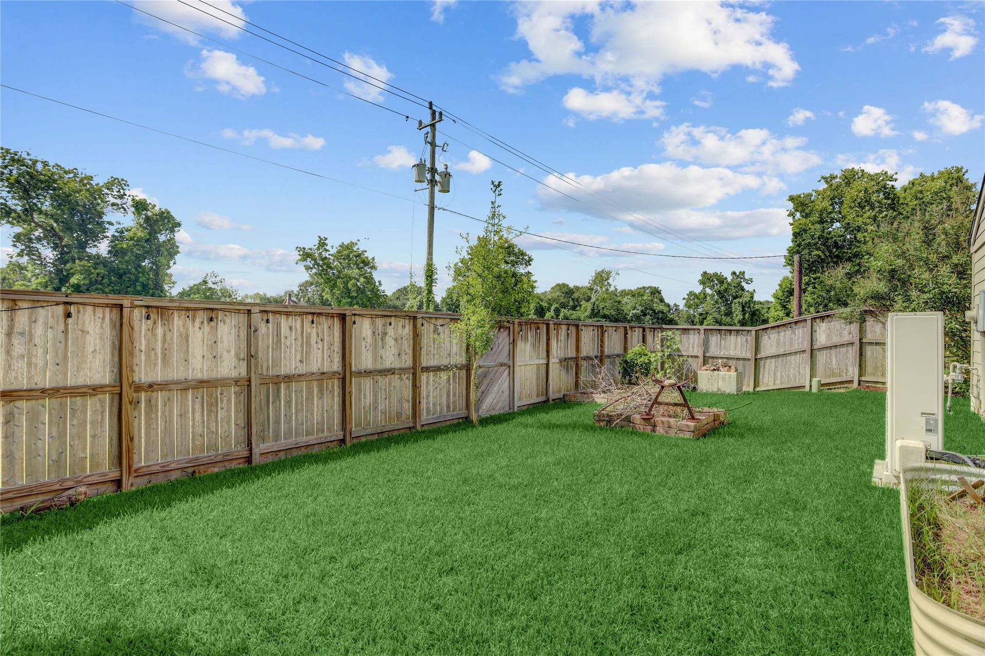 3311 Carmel Valley Drive, Missouri City, TX 77459 Spacious fenced back yard with plenty of room for pets, play, gardening or outdoor entertaining. The mini split AC is only 3 years old.