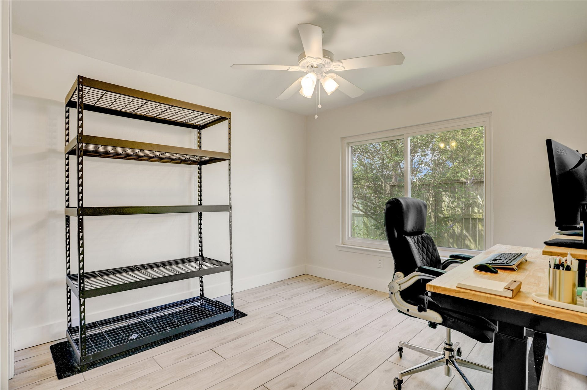 3311 Carmel Valley Drive, Missouri City, TX 77459 The third bedroom has a large picture window overlooking the backyard. Perfect for working from home, a study area, hobby room or additional living space to fit your lifestyle.