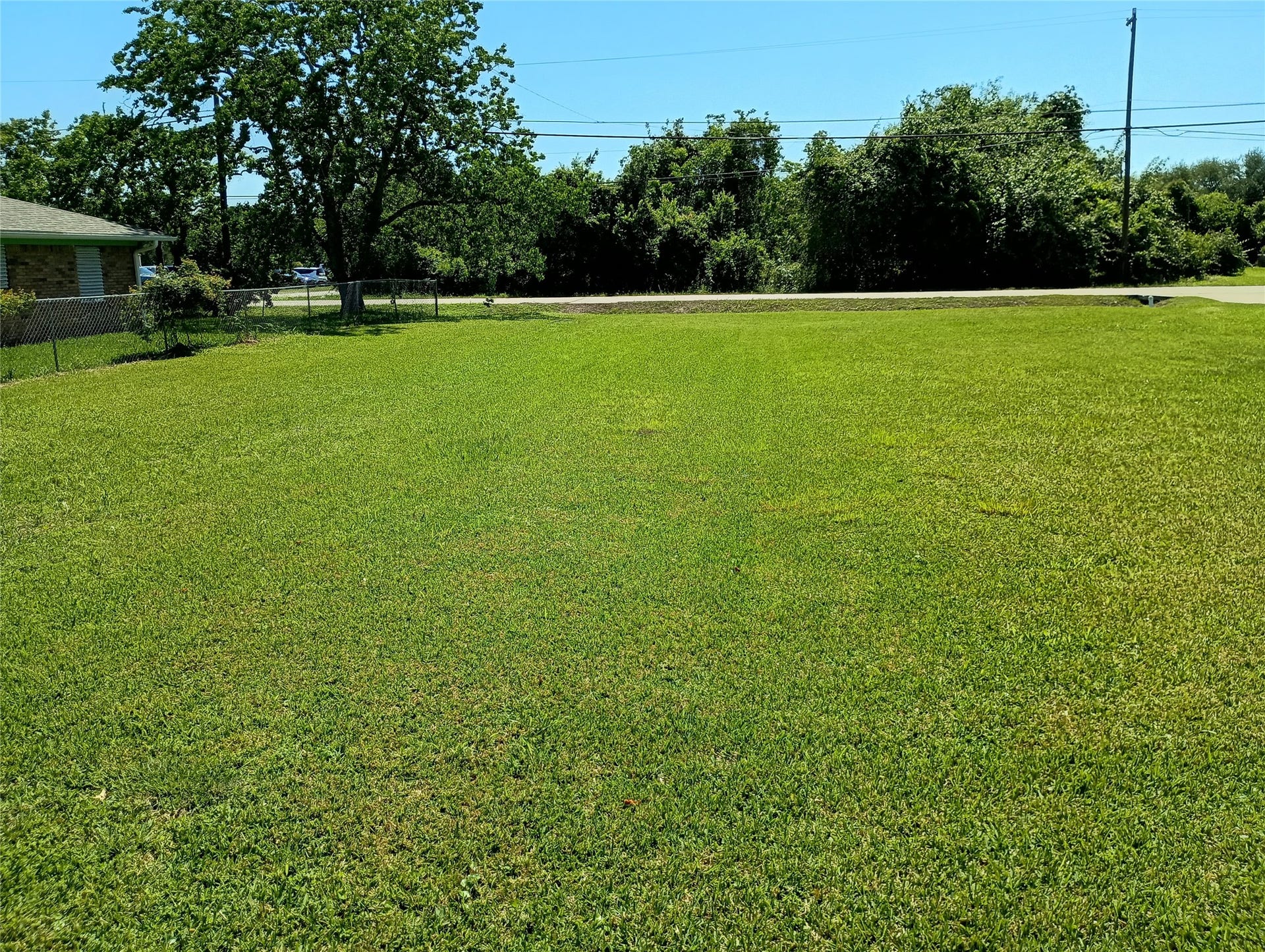 0 Fairwood Road, Hitchcock, TX 77563 The center back part of the lot facing Fairwood Road.