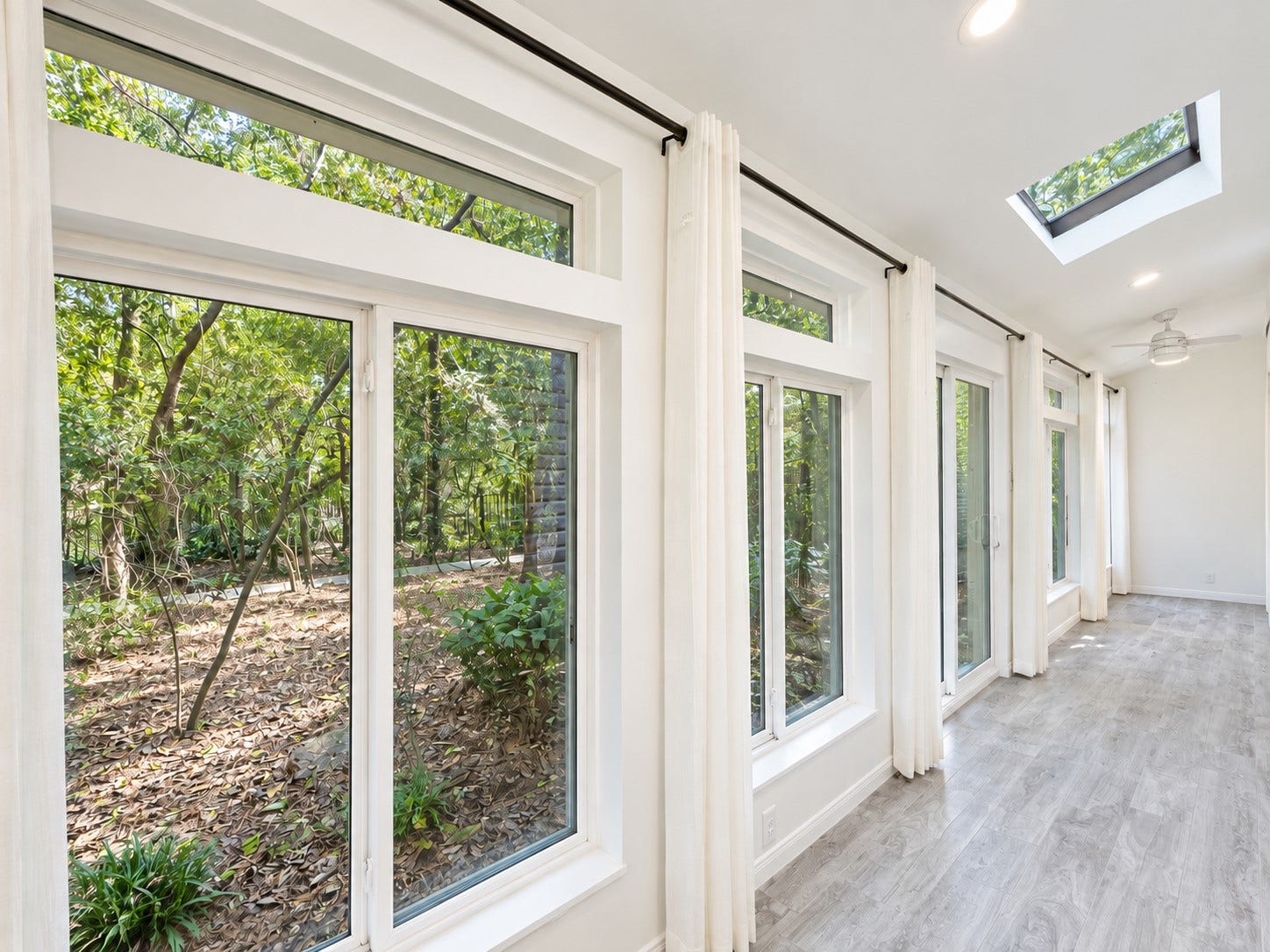 201 Vanderpool Lane, #86, Houston, TX 77024 sunny room next to living area with great view to backyard