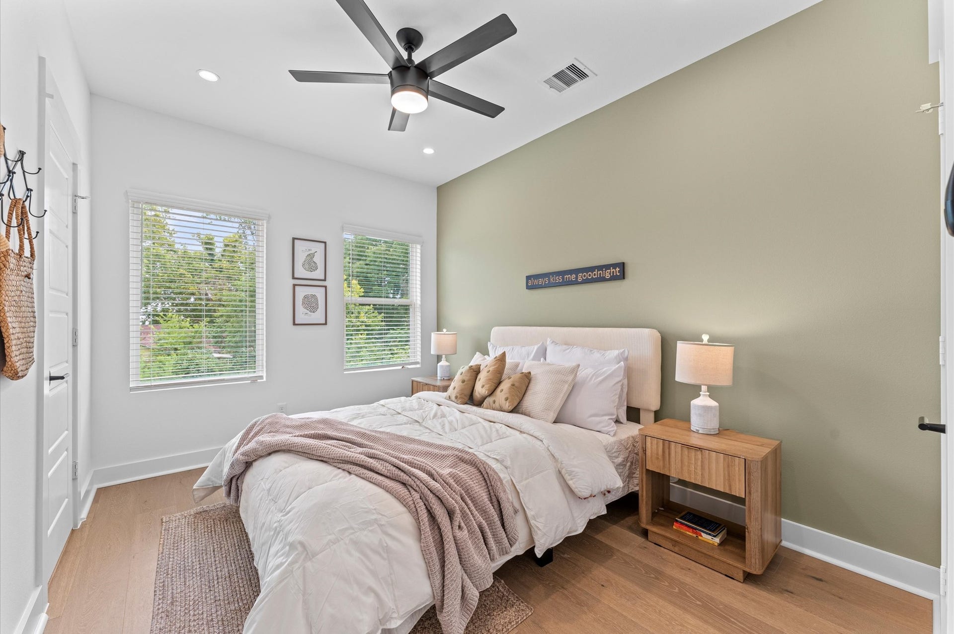 Comfortable and well-appointed secondary bedroom located on the first floor, featuring convenient access to a shared Jack and Jill bathroom