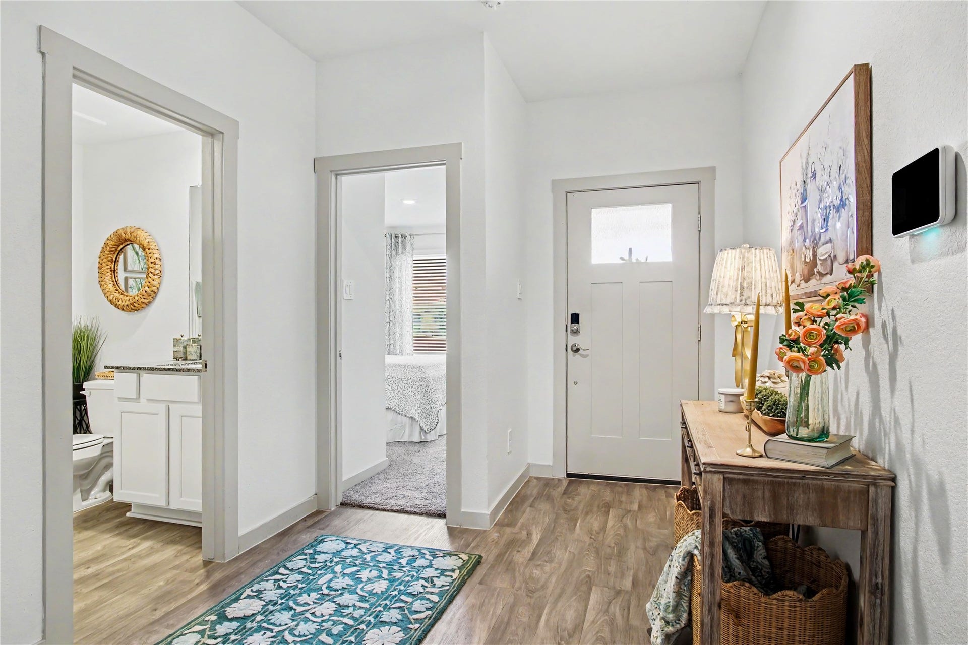 Looking back towards the front door, you see the guest room and guest bath at the front of the home.
