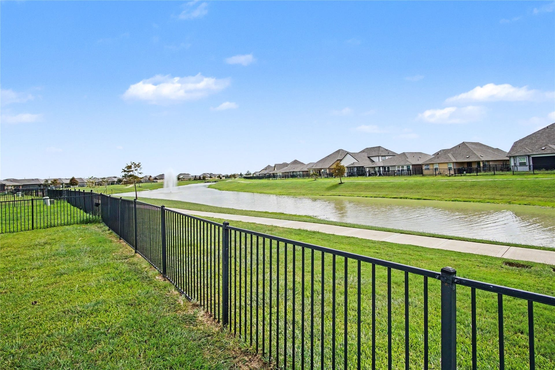 Pretty water views from your back patio.  There's room to breathe, both inside and out of this special home.