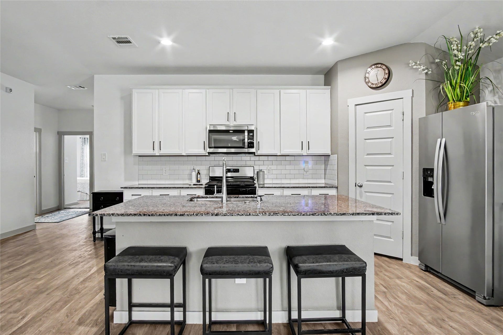 Extra seating is perfect at the island countertop.  Enjoy chatting while the chef cooks!