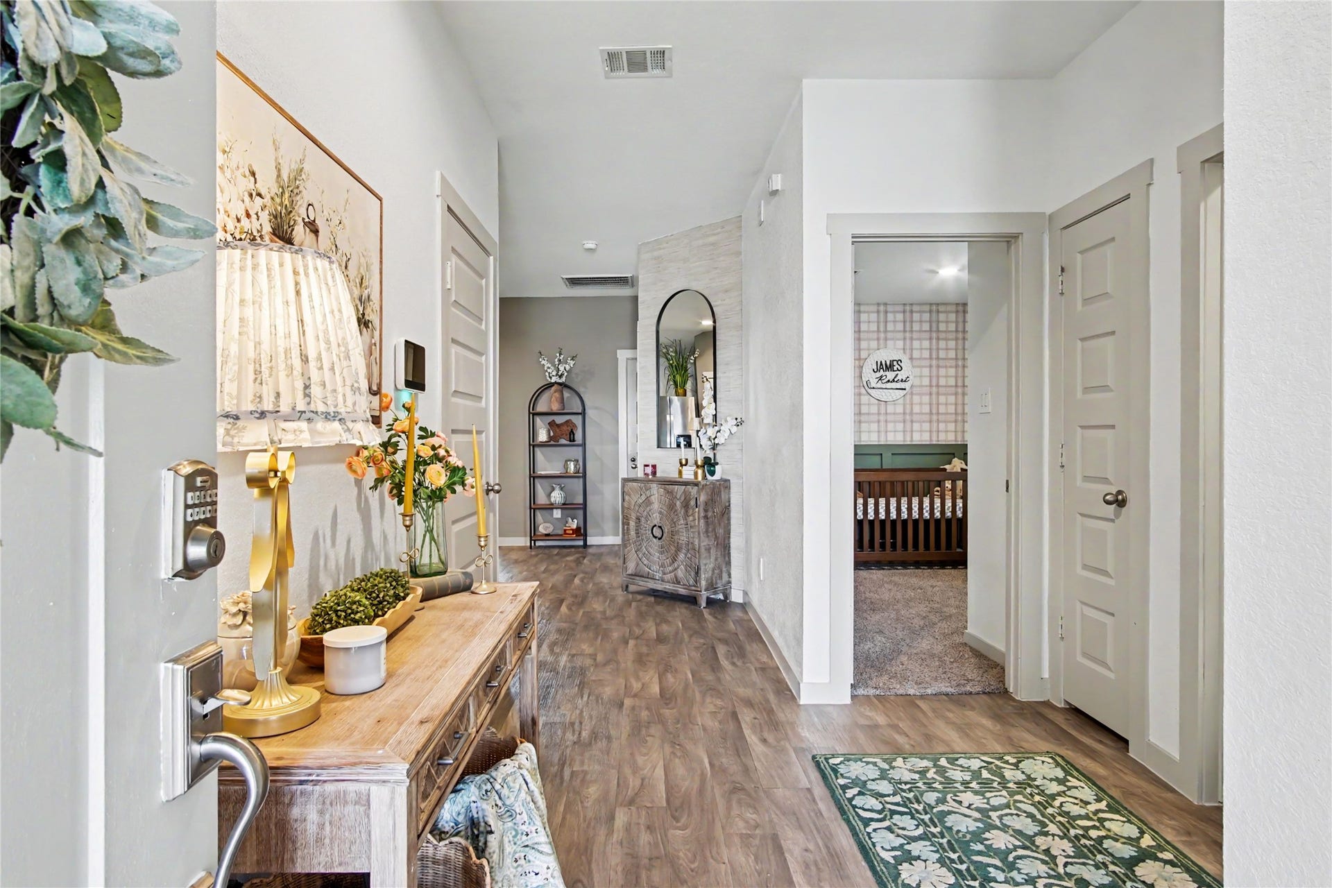 Upon entering, guests are welcomed into the large foyer.  You can't help but notice the light and bright feel to this charming home.  It is immediately apparent that it has been cared for and elevated with designer touches throughout.  Welcome home!