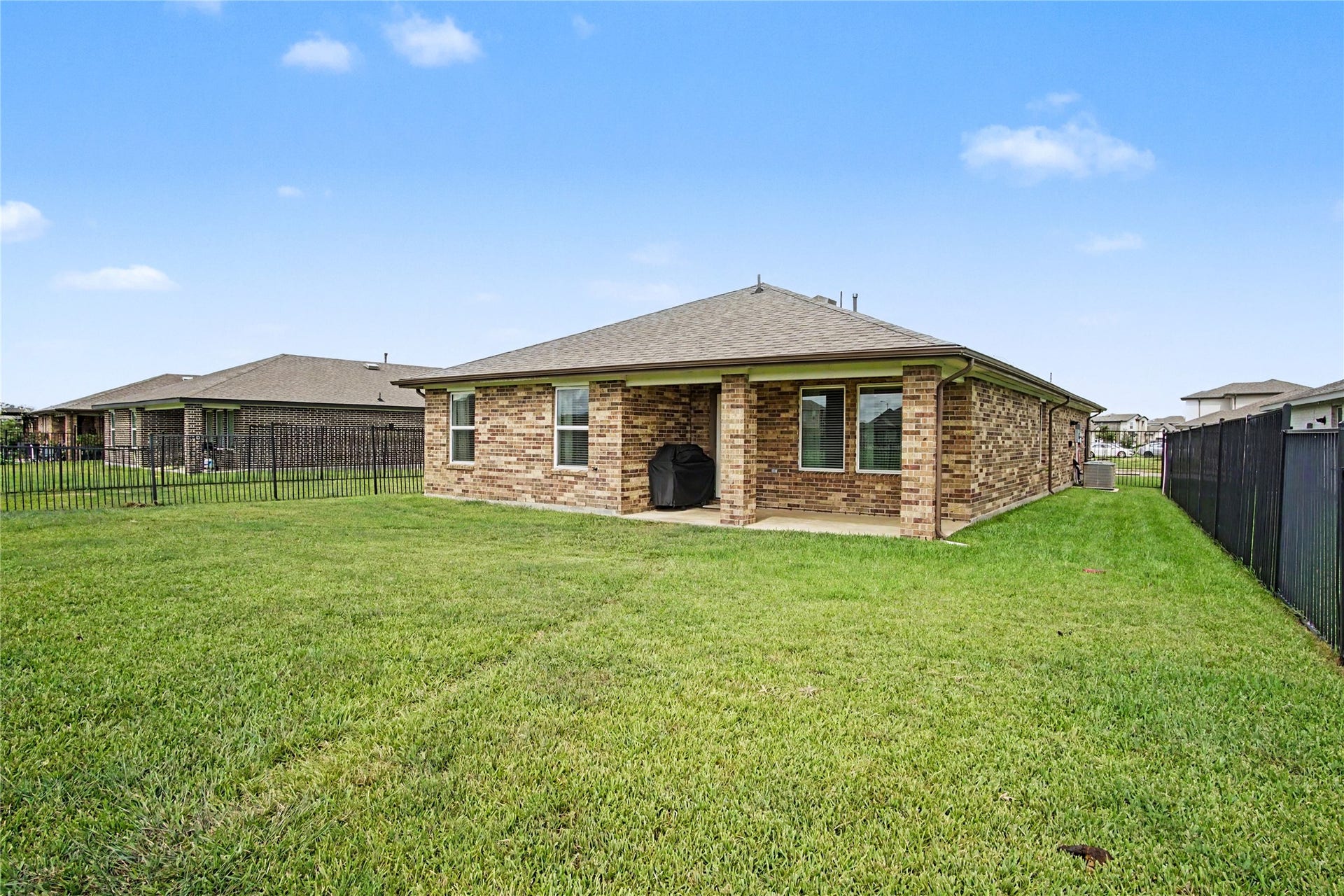 This lovely home is upgraded by having brick on all four sides.