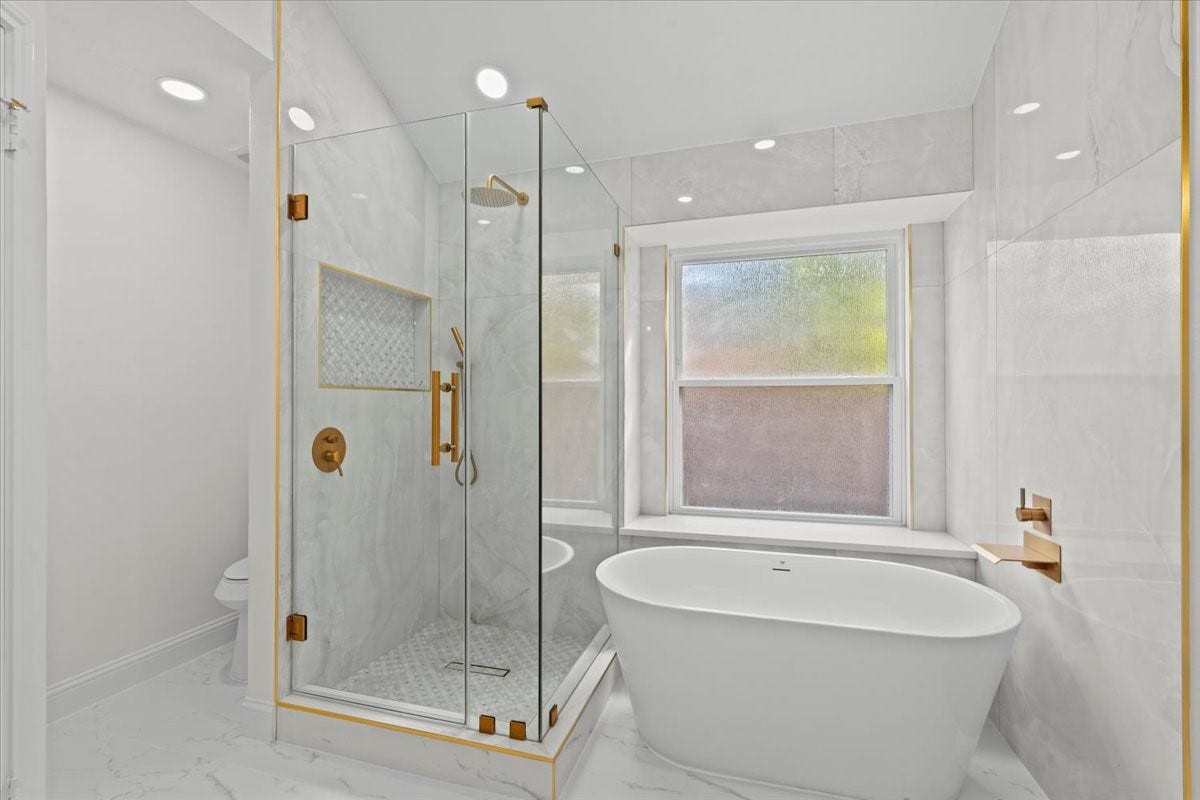1704 San Jose Street, Friendswood, TX 77546 Primary restroom with stand alone tub and shower
