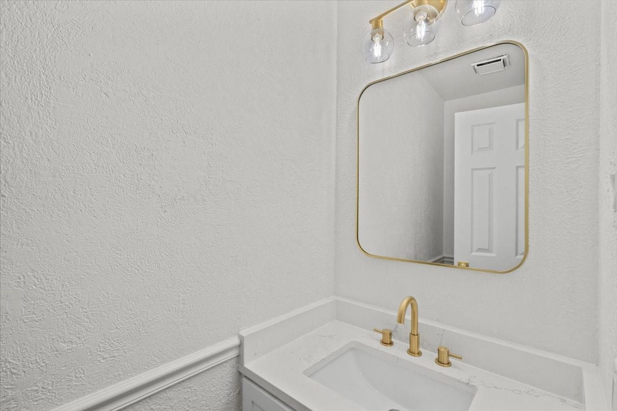 1704 San Jose Street, Friendswood, TX 77546 Downstairs secondary toilet room
